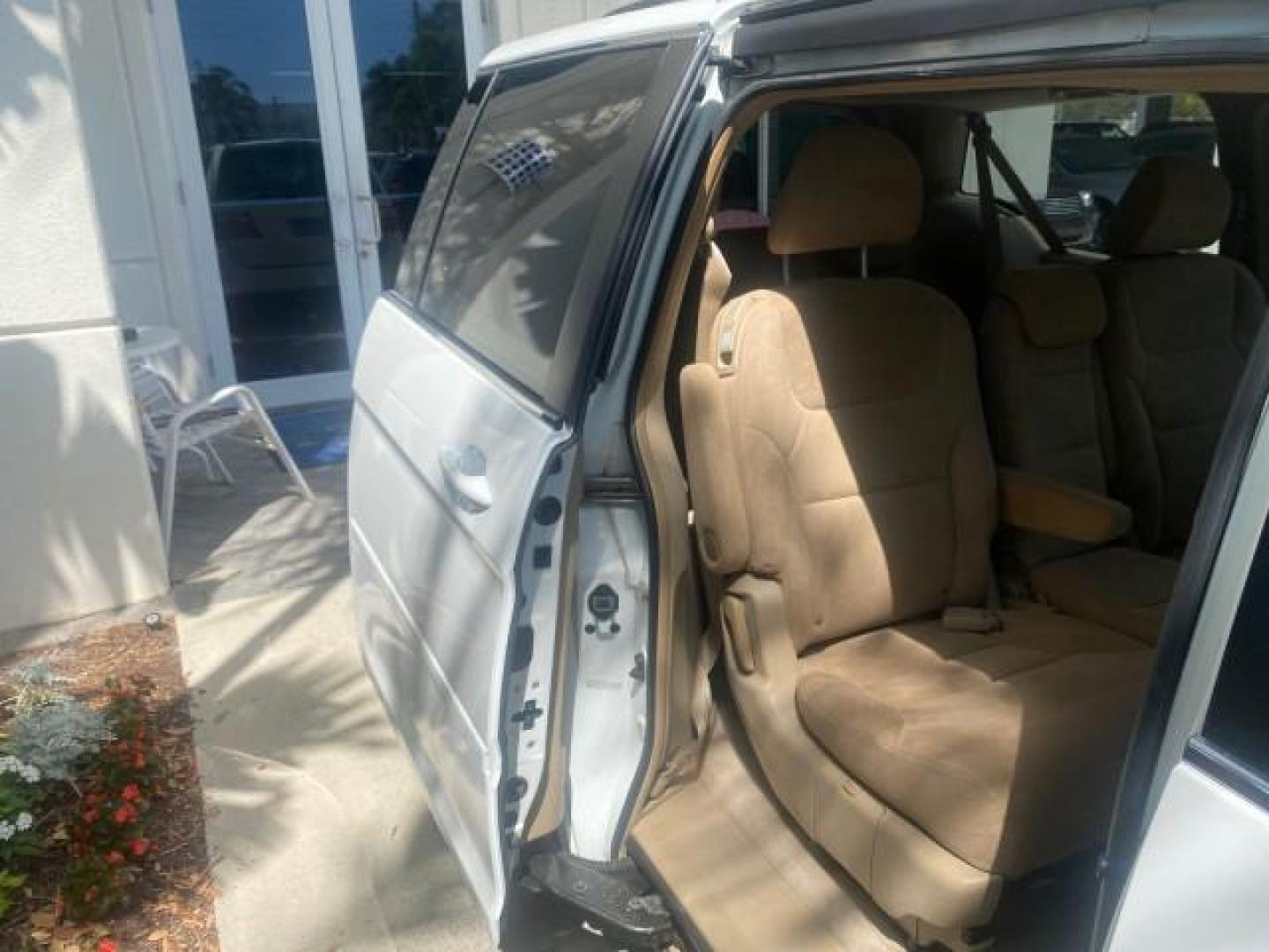2006 Taffeta White /Ivory Honda Odyssey EX 1 OWNER LOW MILES (5FNRL38486B) with an 3.5L SOHC MPFI 24-Valve VTEC V6 Engine engine, Automatic transmission, located at 4701 North Dixie Hwy, Pompano Beach, FL, 33064, (954) 422-2889, 26.240938, -80.123474 - OUR WEBPAGE FLORIDACARS1.COM HAS OVER 100 PHOTOS AND FREE CARFAX LINK 2006 HONDA ODYSSEY EX VIN: 5FNRL38486B405265 5 F N R L 3 8 4 8 6 B 4 0 5 2 6 5 VAN 3.5L V6 F SOHC 24V GASOLINE FRONT WHEEL DRIVE Top Features Alloy Wheels Rear Air Conditioning Cloth Seats Rear Sunshade Fold-Away Third Row Third R - Photo#99