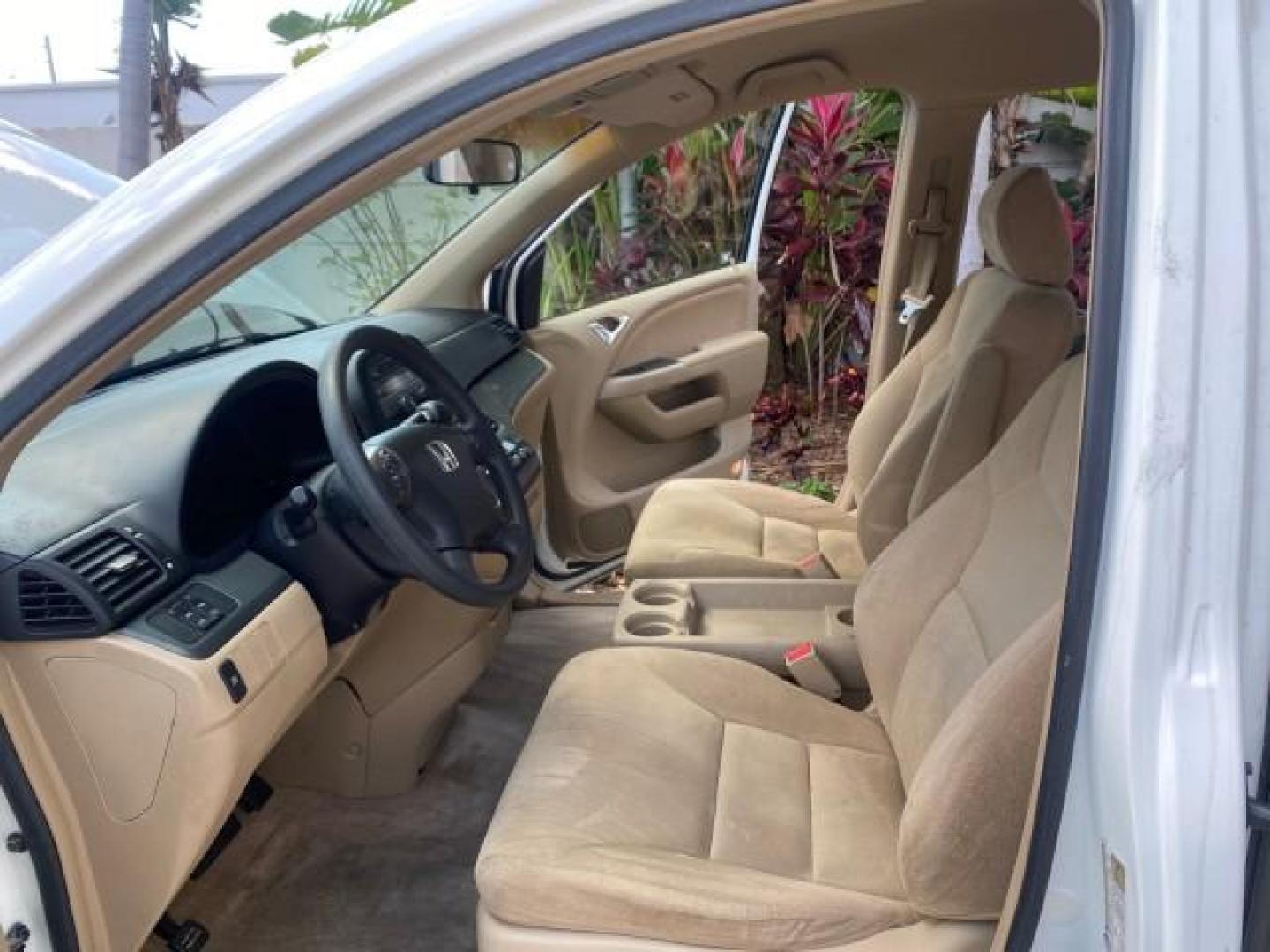 2006 Taffeta White /Ivory Honda Odyssey EX 1 OWNER LOW MILES (5FNRL38486B) with an 3.5L SOHC MPFI 24-Valve VTEC V6 Engine engine, Automatic transmission, located at 4701 North Dixie Hwy, Pompano Beach, FL, 33064, (954) 422-2889, 26.240938, -80.123474 - OUR WEBPAGE FLORIDACARS1.COM HAS OVER 100 PHOTOS AND FREE CARFAX LINK 2006 HONDA ODYSSEY EX VIN: 5FNRL38486B405265 5 F N R L 3 8 4 8 6 B 4 0 5 2 6 5 VAN 3.5L V6 F SOHC 24V GASOLINE FRONT WHEEL DRIVE Top Features Alloy Wheels Rear Air Conditioning Cloth Seats Rear Sunshade Fold-Away Third Row Third R - Photo#10