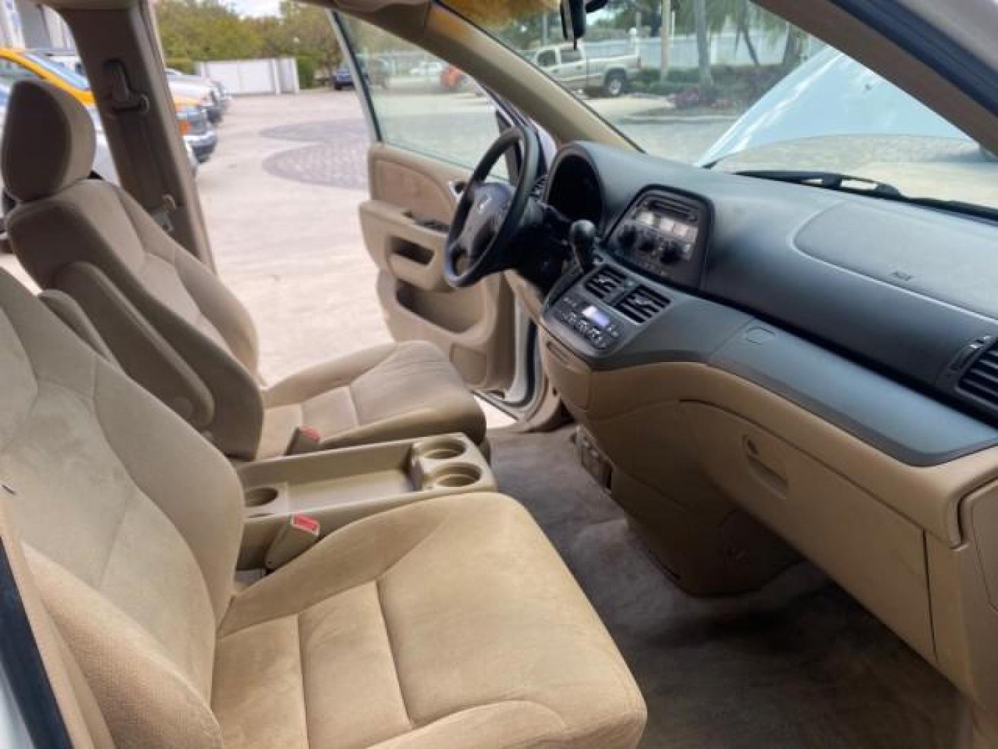 2006 Taffeta White /Ivory Honda Odyssey EX 1 OWNER LOW MILES (5FNRL38486B) with an 3.5L SOHC MPFI 24-Valve VTEC V6 Engine engine, Automatic transmission, located at 4701 North Dixie Hwy, Pompano Beach, FL, 33064, (954) 422-2889, 26.240938, -80.123474 - OUR WEBPAGE FLORIDACARS1.COM HAS OVER 100 PHOTOS AND FREE CARFAX LINK 2006 HONDA ODYSSEY EX VIN: 5FNRL38486B405265 5 F N R L 3 8 4 8 6 B 4 0 5 2 6 5 VAN 3.5L V6 F SOHC 24V GASOLINE FRONT WHEEL DRIVE Top Features Alloy Wheels Rear Air Conditioning Cloth Seats Rear Sunshade Fold-Away Third Row Third R - Photo#12