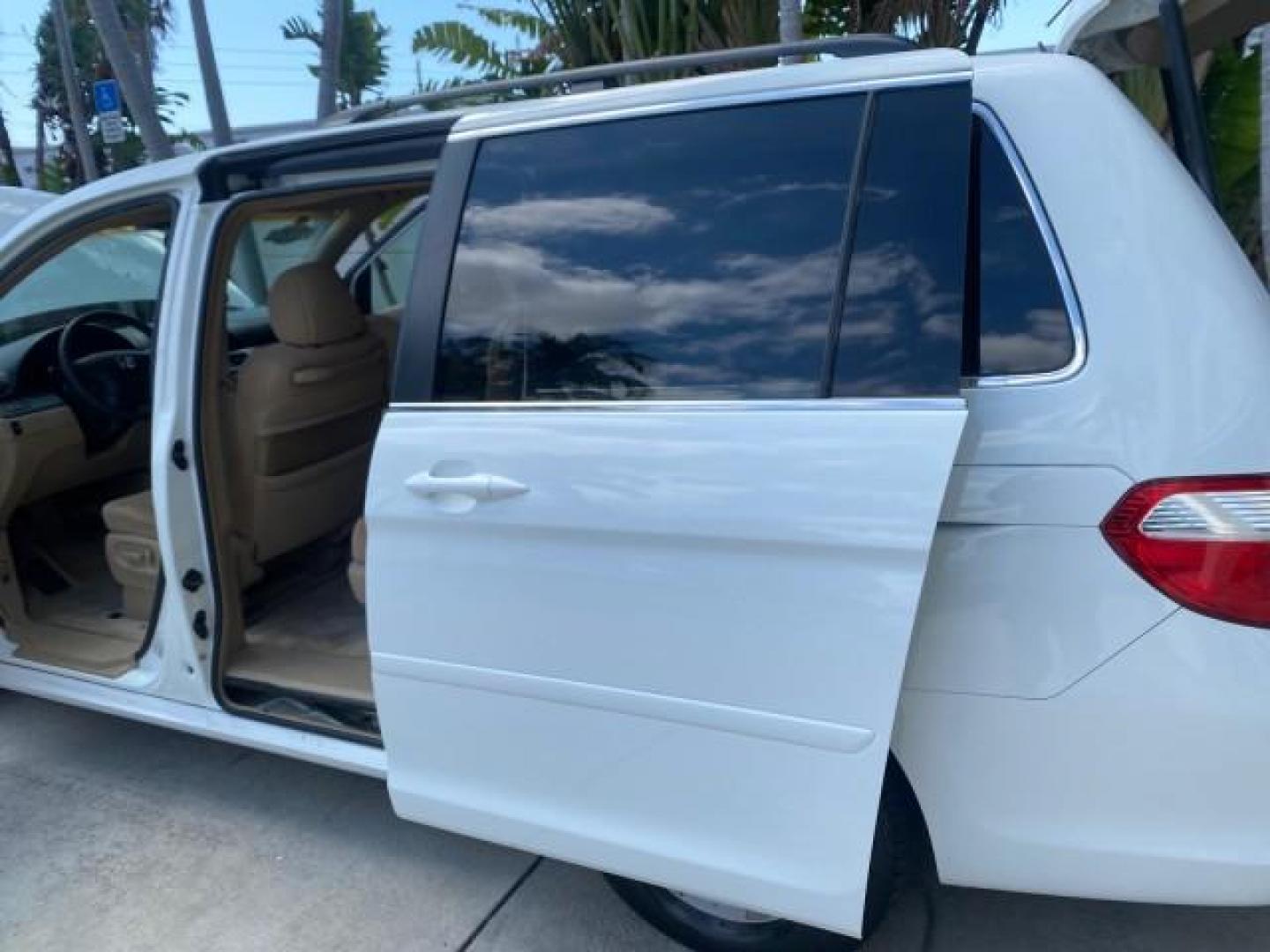 2006 Taffeta White /Ivory Honda Odyssey EX 1 OWNER LOW MILES (5FNRL38486B) with an 3.5L SOHC MPFI 24-Valve VTEC V6 Engine engine, Automatic transmission, located at 4701 North Dixie Hwy, Pompano Beach, FL, 33064, (954) 422-2889, 26.240938, -80.123474 - OUR WEBPAGE FLORIDACARS1.COM HAS OVER 100 PHOTOS AND FREE CARFAX LINK 2006 HONDA ODYSSEY EX VIN: 5FNRL38486B405265 5 F N R L 3 8 4 8 6 B 4 0 5 2 6 5 VAN 3.5L V6 F SOHC 24V GASOLINE FRONT WHEEL DRIVE Top Features Alloy Wheels Rear Air Conditioning Cloth Seats Rear Sunshade Fold-Away Third Row Third R - Photo#13