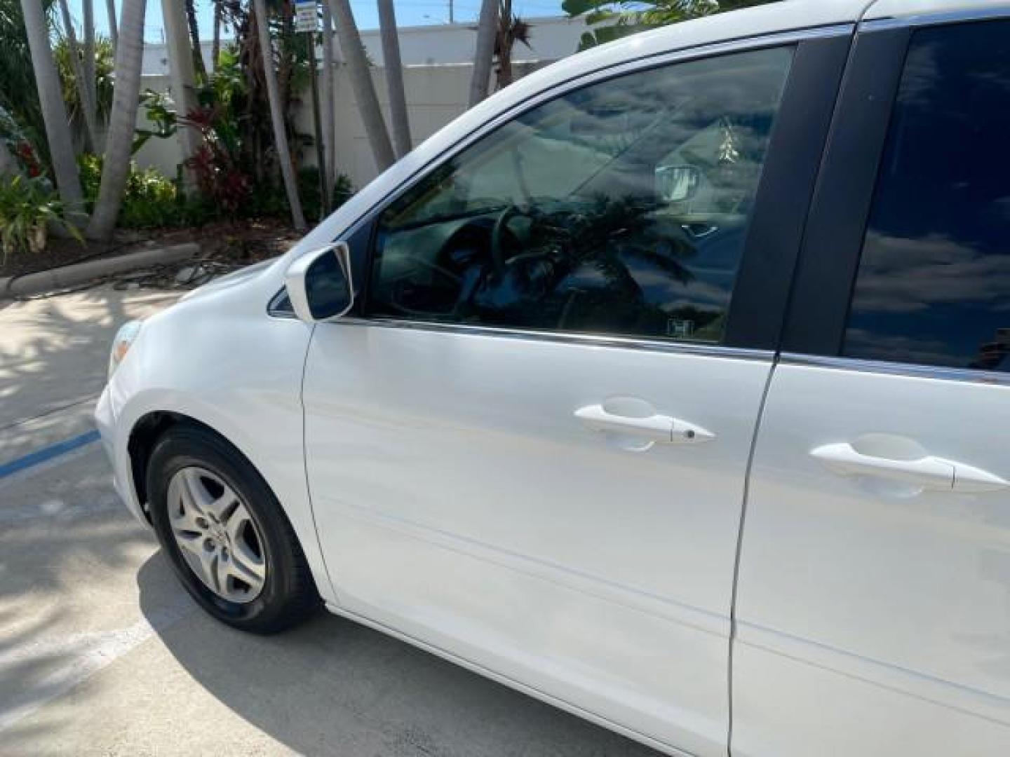 2006 Taffeta White /Ivory Honda Odyssey EX 1 OWNER LOW MILES (5FNRL38486B) with an 3.5L SOHC MPFI 24-Valve VTEC V6 Engine engine, Automatic transmission, located at 4701 North Dixie Hwy, Pompano Beach, FL, 33064, (954) 422-2889, 26.240938, -80.123474 - OUR WEBPAGE FLORIDACARS1.COM HAS OVER 100 PHOTOS AND FREE CARFAX LINK 2006 HONDA ODYSSEY EX VIN: 5FNRL38486B405265 5 F N R L 3 8 4 8 6 B 4 0 5 2 6 5 VAN 3.5L V6 F SOHC 24V GASOLINE FRONT WHEEL DRIVE Top Features Alloy Wheels Rear Air Conditioning Cloth Seats Rear Sunshade Fold-Away Third Row Third R - Photo#26