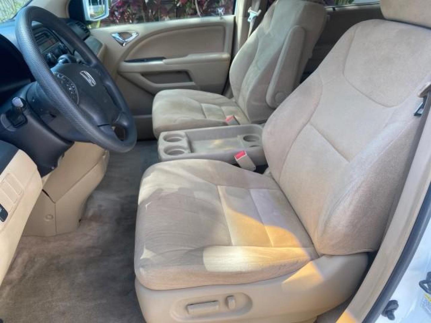 2006 Taffeta White /Ivory Honda Odyssey EX 1 OWNER LOW MILES (5FNRL38486B) with an 3.5L SOHC MPFI 24-Valve VTEC V6 Engine engine, Automatic transmission, located at 4701 North Dixie Hwy, Pompano Beach, FL, 33064, (954) 422-2889, 26.240938, -80.123474 - OUR WEBPAGE FLORIDACARS1.COM HAS OVER 100 PHOTOS AND FREE CARFAX LINK 2006 HONDA ODYSSEY EX VIN: 5FNRL38486B405265 5 F N R L 3 8 4 8 6 B 4 0 5 2 6 5 VAN 3.5L V6 F SOHC 24V GASOLINE FRONT WHEEL DRIVE Top Features Alloy Wheels Rear Air Conditioning Cloth Seats Rear Sunshade Fold-Away Third Row Third R - Photo#33