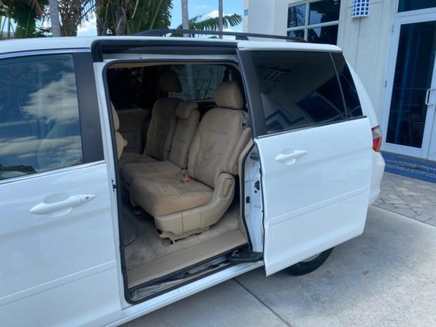 2006 Taffeta White /Ivory Honda Odyssey EX 1 OWNER LOW MILES (5FNRL38486B) with an 3.5L SOHC MPFI 24-Valve VTEC V6 Engine engine, Automatic transmission, located at 4701 North Dixie Hwy, Pompano Beach, FL, 33064, (954) 422-2889, 26.240938, -80.123474 - OUR WEBPAGE FLORIDACARS1.COM HAS OVER 100 PHOTOS AND FREE CARFAX LINK 2006 HONDA ODYSSEY EX VIN: 5FNRL38486B405265 5 F N R L 3 8 4 8 6 B 4 0 5 2 6 5 VAN 3.5L V6 F SOHC 24V GASOLINE FRONT WHEEL DRIVE Top Features Alloy Wheels Rear Air Conditioning Cloth Seats Rear Sunshade Fold-Away Third Row Third R - Photo#59