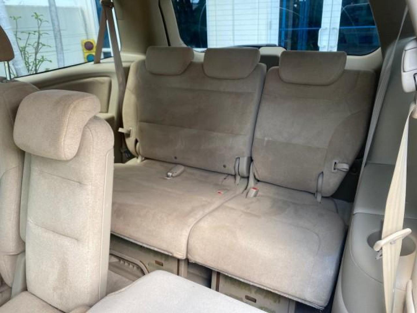 2006 Taffeta White /Ivory Honda Odyssey EX 1 OWNER LOW MILES (5FNRL38486B) with an 3.5L SOHC MPFI 24-Valve VTEC V6 Engine engine, Automatic transmission, located at 4701 North Dixie Hwy, Pompano Beach, FL, 33064, (954) 422-2889, 26.240938, -80.123474 - OUR WEBPAGE FLORIDACARS1.COM HAS OVER 100 PHOTOS AND FREE CARFAX LINK 2006 HONDA ODYSSEY EX VIN: 5FNRL38486B405265 5 F N R L 3 8 4 8 6 B 4 0 5 2 6 5 VAN 3.5L V6 F SOHC 24V GASOLINE FRONT WHEEL DRIVE Top Features Alloy Wheels Rear Air Conditioning Cloth Seats Rear Sunshade Fold-Away Third Row Third R - Photo#63