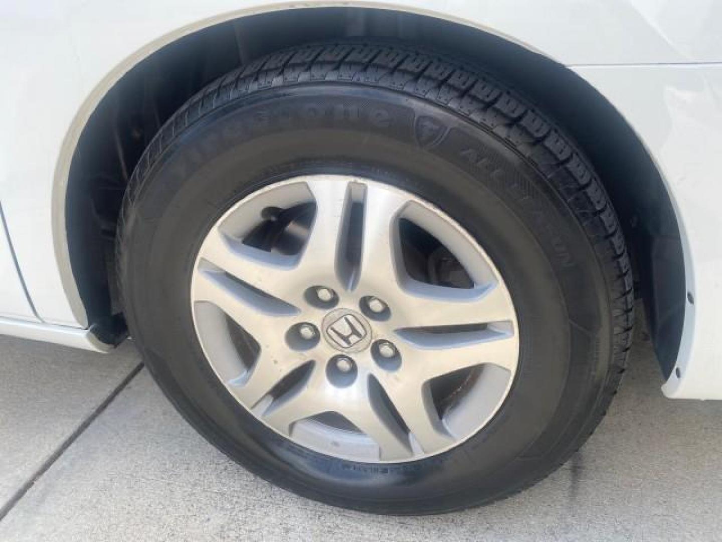 2006 Taffeta White /Ivory Honda Odyssey EX 1 OWNER LOW MILES (5FNRL38486B) with an 3.5L SOHC MPFI 24-Valve VTEC V6 Engine engine, Automatic transmission, located at 4701 North Dixie Hwy, Pompano Beach, FL, 33064, (954) 422-2889, 26.240938, -80.123474 - OUR WEBPAGE FLORIDACARS1.COM HAS OVER 100 PHOTOS AND FREE CARFAX LINK 2006 HONDA ODYSSEY EX VIN: 5FNRL38486B405265 5 F N R L 3 8 4 8 6 B 4 0 5 2 6 5 VAN 3.5L V6 F SOHC 24V GASOLINE FRONT WHEEL DRIVE Top Features Alloy Wheels Rear Air Conditioning Cloth Seats Rear Sunshade Fold-Away Third Row Third R - Photo#82