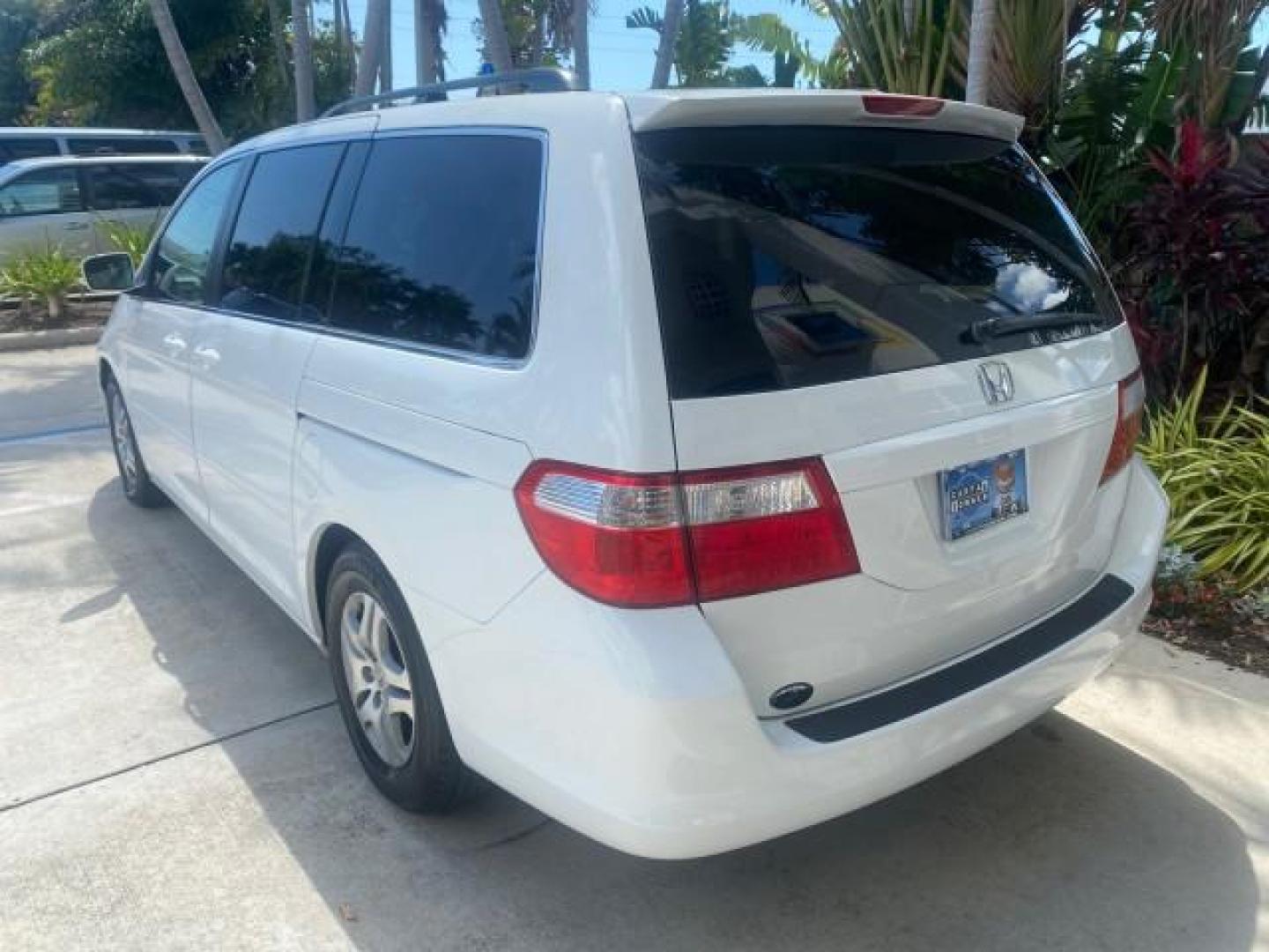 2006 Taffeta White /Ivory Honda Odyssey EX 1 OWNER LOW MILES (5FNRL38486B) with an 3.5L SOHC MPFI 24-Valve VTEC V6 Engine engine, Automatic transmission, located at 4701 North Dixie Hwy, Pompano Beach, FL, 33064, (954) 422-2889, 26.240938, -80.123474 - OUR WEBPAGE FLORIDACARS1.COM HAS OVER 100 PHOTOS AND FREE CARFAX LINK 2006 HONDA ODYSSEY EX VIN: 5FNRL38486B405265 5 F N R L 3 8 4 8 6 B 4 0 5 2 6 5 VAN 3.5L V6 F SOHC 24V GASOLINE FRONT WHEEL DRIVE Top Features Alloy Wheels Rear Air Conditioning Cloth Seats Rear Sunshade Fold-Away Third Row Third R - Photo#84