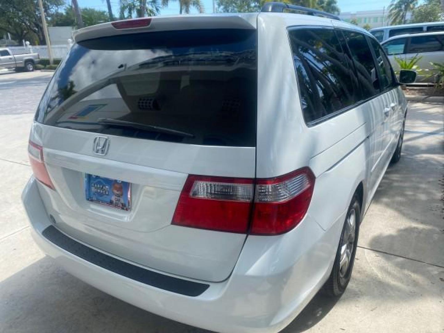 2006 Taffeta White /Ivory Honda Odyssey EX 1 OWNER LOW MILES (5FNRL38486B) with an 3.5L SOHC MPFI 24-Valve VTEC V6 Engine engine, Automatic transmission, located at 4701 North Dixie Hwy, Pompano Beach, FL, 33064, (954) 422-2889, 26.240938, -80.123474 - OUR WEBPAGE FLORIDACARS1.COM HAS OVER 100 PHOTOS AND FREE CARFAX LINK 2006 HONDA ODYSSEY EX VIN: 5FNRL38486B405265 5 F N R L 3 8 4 8 6 B 4 0 5 2 6 5 VAN 3.5L V6 F SOHC 24V GASOLINE FRONT WHEEL DRIVE Top Features Alloy Wheels Rear Air Conditioning Cloth Seats Rear Sunshade Fold-Away Third Row Third R - Photo#86
