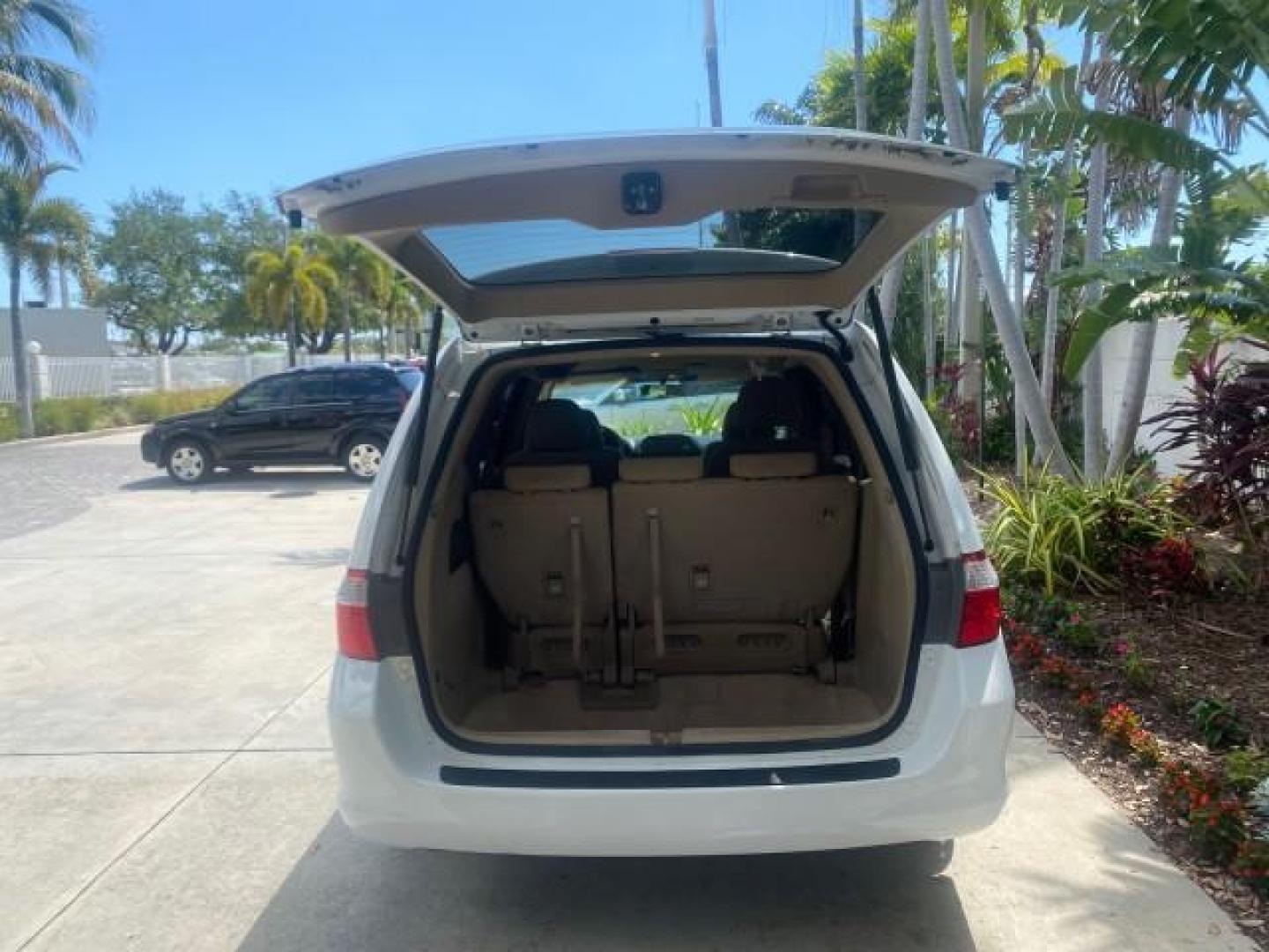 2006 Taffeta White /Ivory Honda Odyssey EX 1 OWNER LOW MILES (5FNRL38486B) with an 3.5L SOHC MPFI 24-Valve VTEC V6 Engine engine, Automatic transmission, located at 4701 North Dixie Hwy, Pompano Beach, FL, 33064, (954) 422-2889, 26.240938, -80.123474 - OUR WEBPAGE FLORIDACARS1.COM HAS OVER 100 PHOTOS AND FREE CARFAX LINK 2006 HONDA ODYSSEY EX VIN: 5FNRL38486B405265 5 F N R L 3 8 4 8 6 B 4 0 5 2 6 5 VAN 3.5L V6 F SOHC 24V GASOLINE FRONT WHEEL DRIVE Top Features Alloy Wheels Rear Air Conditioning Cloth Seats Rear Sunshade Fold-Away Third Row Third R - Photo#87