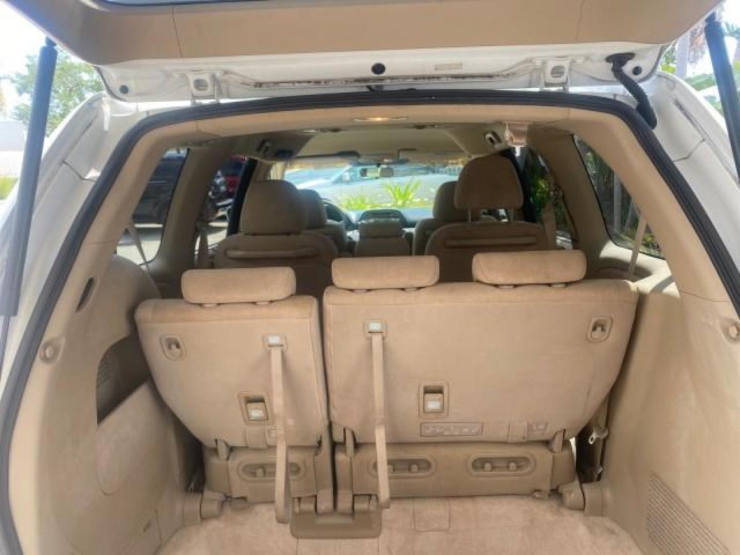 2006 Taffeta White /Ivory Honda Odyssey EX 1 OWNER LOW MILES (5FNRL38486B) with an 3.5L SOHC MPFI 24-Valve VTEC V6 Engine engine, Automatic transmission, located at 4701 North Dixie Hwy, Pompano Beach, FL, 33064, (954) 422-2889, 26.240938, -80.123474 - OUR WEBPAGE FLORIDACARS1.COM HAS OVER 100 PHOTOS AND FREE CARFAX LINK 2006 HONDA ODYSSEY EX VIN: 5FNRL38486B405265 5 F N R L 3 8 4 8 6 B 4 0 5 2 6 5 VAN 3.5L V6 F SOHC 24V GASOLINE FRONT WHEEL DRIVE Top Features Alloy Wheels Rear Air Conditioning Cloth Seats Rear Sunshade Fold-Away Third Row Third R - Photo#88