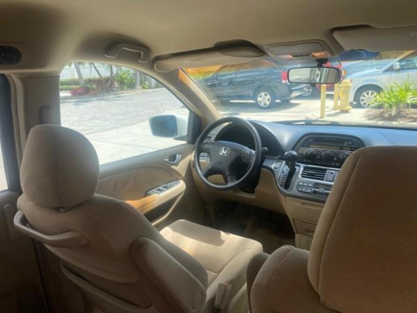 2006 Taffeta White /Ivory Honda Odyssey EX 1 OWNER LOW MILES (5FNRL38486B) with an 3.5L SOHC MPFI 24-Valve VTEC V6 Engine engine, Automatic transmission, located at 4701 North Dixie Hwy, Pompano Beach, FL, 33064, (954) 422-2889, 26.240938, -80.123474 - OUR WEBPAGE FLORIDACARS1.COM HAS OVER 100 PHOTOS AND FREE CARFAX LINK 2006 HONDA ODYSSEY EX VIN: 5FNRL38486B405265 5 F N R L 3 8 4 8 6 B 4 0 5 2 6 5 VAN 3.5L V6 F SOHC 24V GASOLINE FRONT WHEEL DRIVE Top Features Alloy Wheels Rear Air Conditioning Cloth Seats Rear Sunshade Fold-Away Third Row Third R - Photo#97