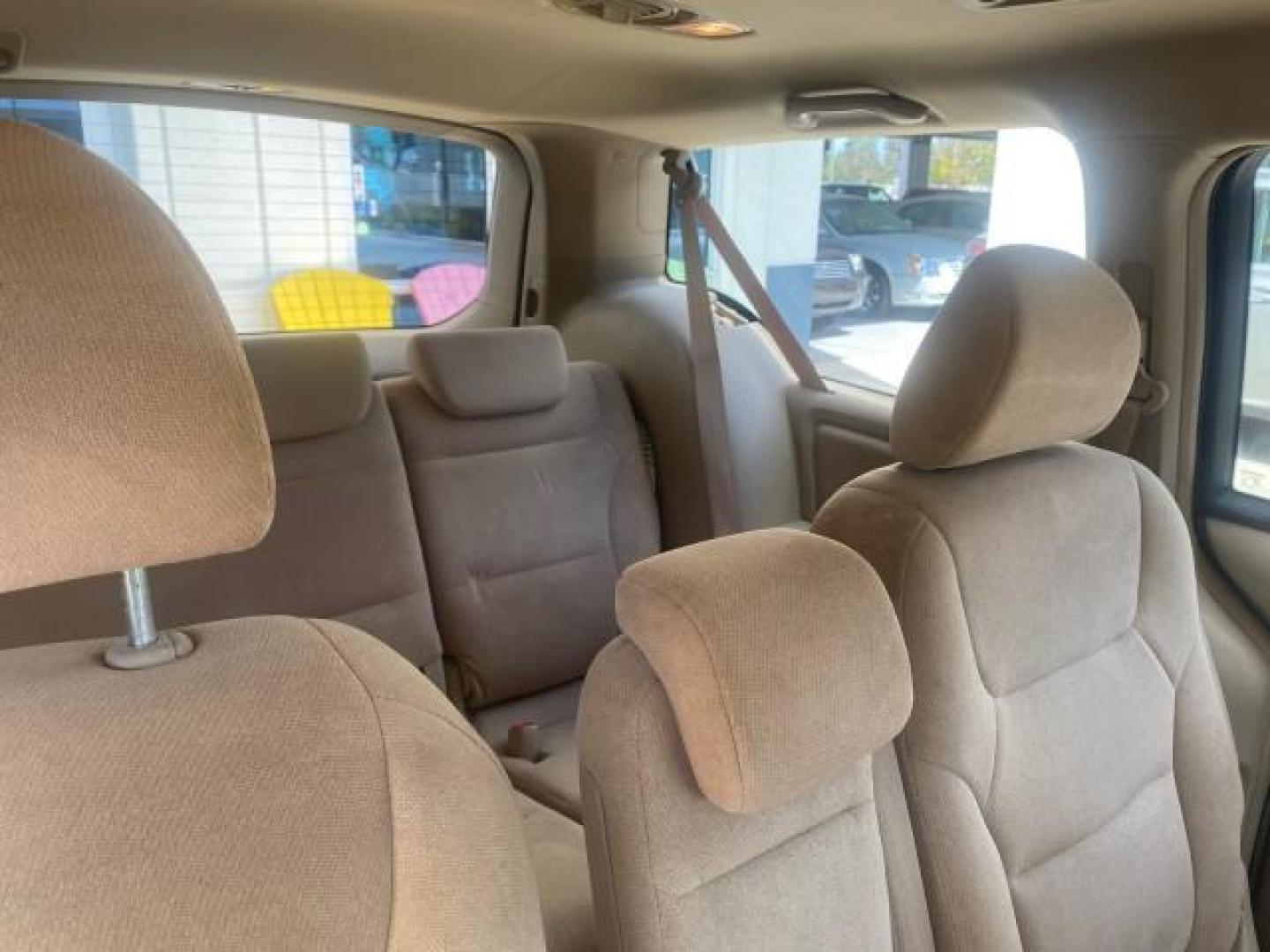 2006 Taffeta White /Ivory Honda Odyssey EX 1 OWNER LOW MILES (5FNRL38486B) with an 3.5L SOHC MPFI 24-Valve VTEC V6 Engine engine, Automatic transmission, located at 4701 North Dixie Hwy, Pompano Beach, FL, 33064, (954) 422-2889, 26.240938, -80.123474 - OUR WEBPAGE FLORIDACARS1.COM HAS OVER 100 PHOTOS AND FREE CARFAX LINK 2006 HONDA ODYSSEY EX VIN: 5FNRL38486B405265 5 F N R L 3 8 4 8 6 B 4 0 5 2 6 5 VAN 3.5L V6 F SOHC 24V GASOLINE FRONT WHEEL DRIVE Top Features Alloy Wheels Rear Air Conditioning Cloth Seats Rear Sunshade Fold-Away Third Row Third R - Photo#98
