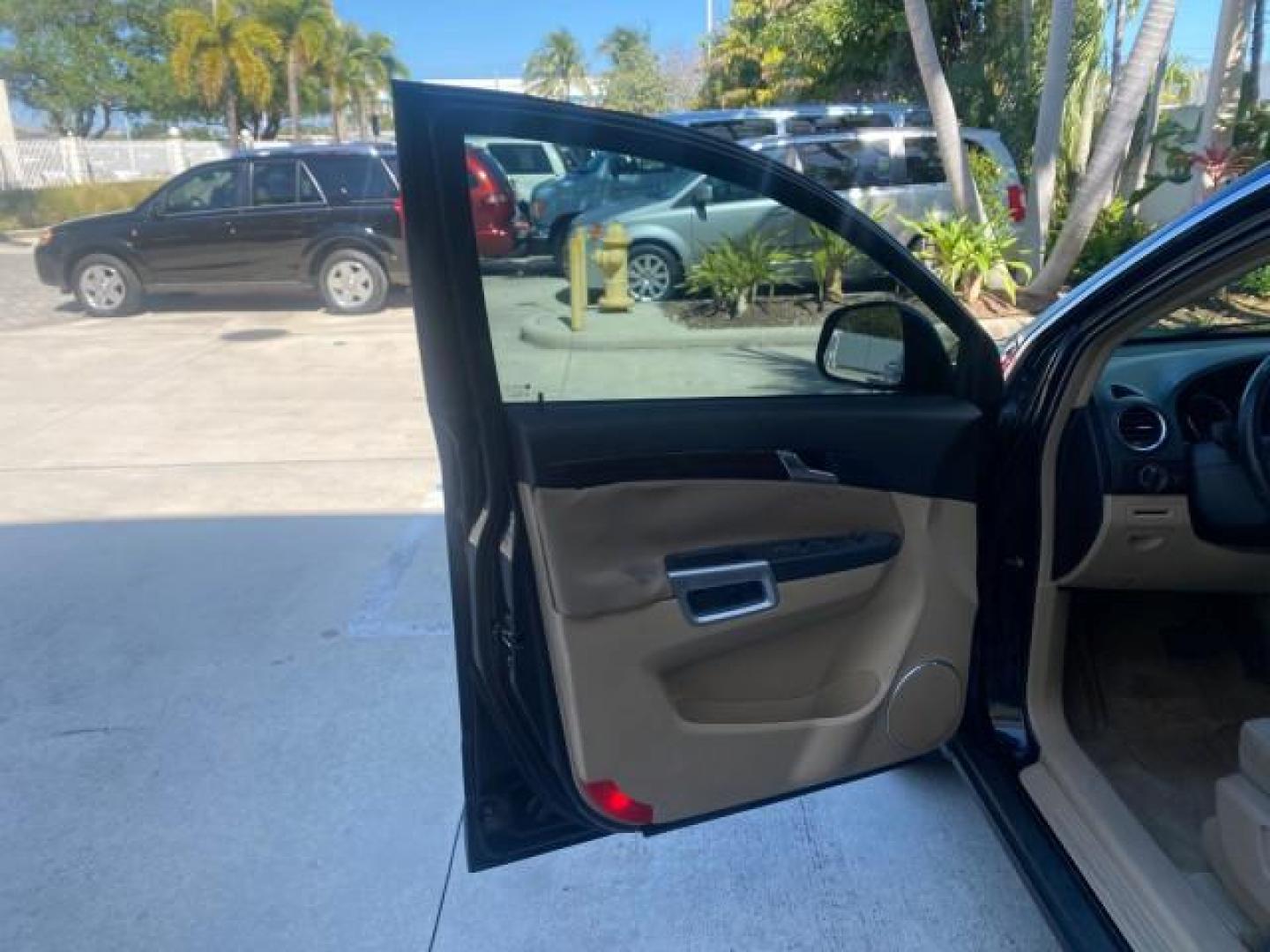 2008 Black Onyx /Tan Saturn VUE XE 1 OWNER FL LOW MILES 56,371 (3GSCL33P28S) with an Ecotec 2.4L 4-Cyl MFI Engine engine, Automatic transmission, located at 4701 North Dixie Hwy, Pompano Beach, FL, 33064, (954) 422-2889, 26.240938, -80.123474 - OUR WEBPAGE FLORIDACARS1.COM HAS OVER 100 PHOTOS AND FREE CARFAX LINK 2008 SATURN VUE XE VIN: 3GSCL33P28S503617 3 G S C L 3 3 P 2 8 S 5 0 3 6 1 7 4 DOOR WAGON/SPORT UTILITY 2.4L I4 F 26 MPG GASOLINE FRONT WHEEL DRIVE Top Features Alloy Wheels Cloth Seats Satellite Radio Ready Basic Features ABS Brak - Photo#9