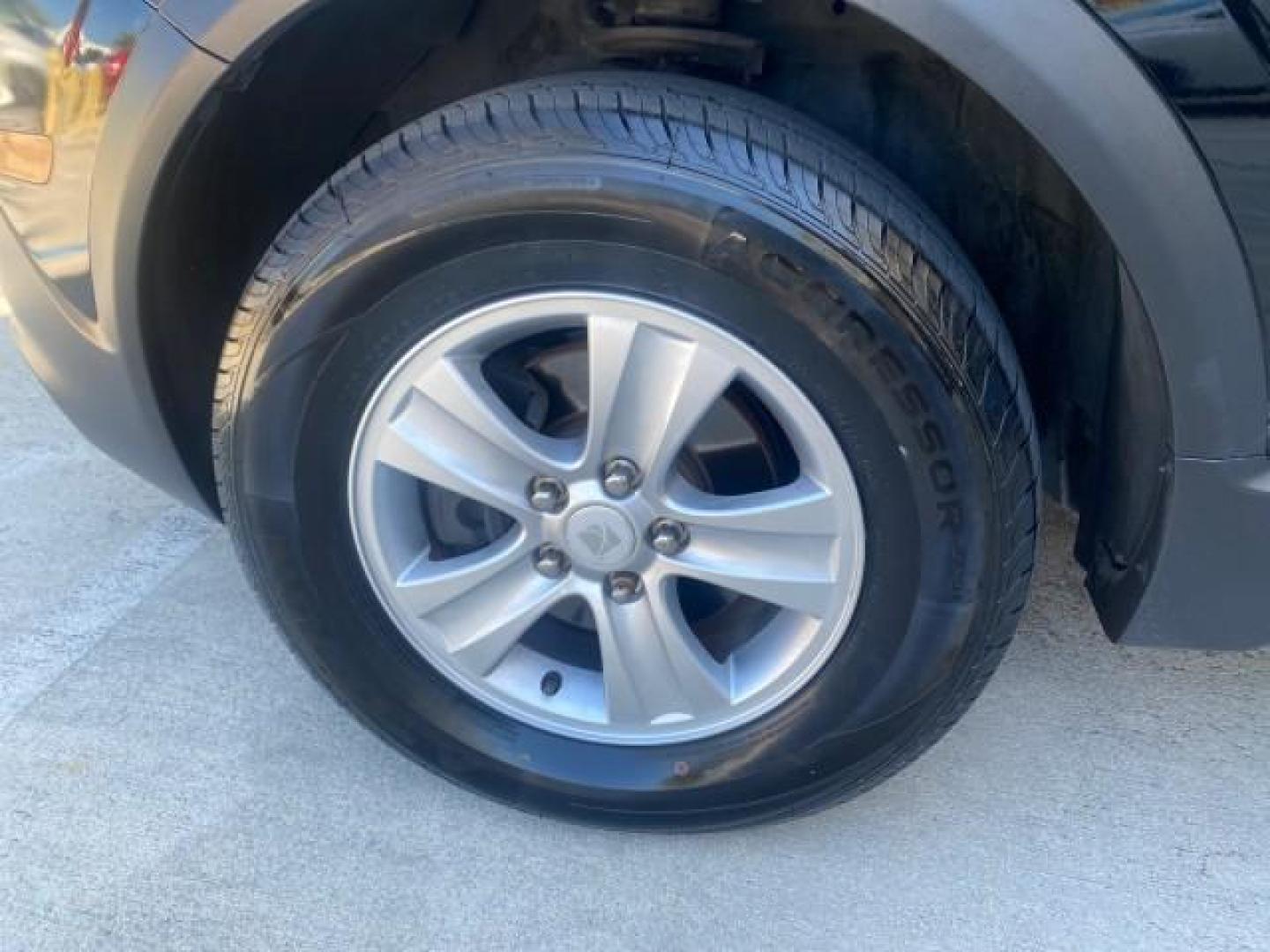 2008 Black Onyx /Tan Saturn VUE XE 1 OWNER FL LOW MILES 56,371 (3GSCL33P28S) with an Ecotec 2.4L 4-Cyl MFI Engine engine, Automatic transmission, located at 4701 North Dixie Hwy, Pompano Beach, FL, 33064, (954) 422-2889, 26.240938, -80.123474 - OUR WEBPAGE FLORIDACARS1.COM HAS OVER 100 PHOTOS AND FREE CARFAX LINK 2008 SATURN VUE XE VIN: 3GSCL33P28S503617 3 G S C L 3 3 P 2 8 S 5 0 3 6 1 7 4 DOOR WAGON/SPORT UTILITY 2.4L I4 F 26 MPG GASOLINE FRONT WHEEL DRIVE Top Features Alloy Wheels Cloth Seats Satellite Radio Ready Basic Features ABS Brak - Photo#19