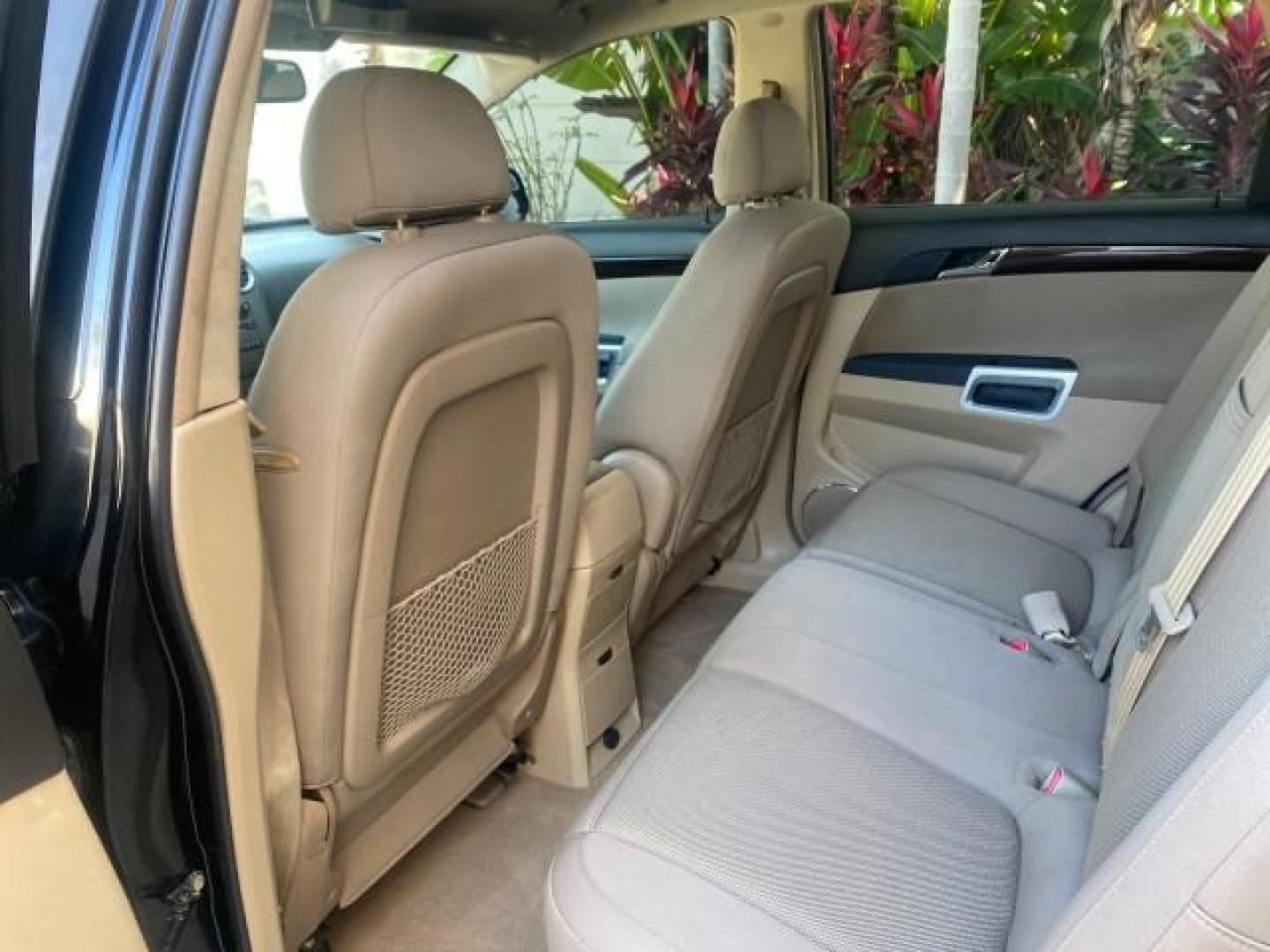 2008 Black Onyx /Tan Saturn VUE XE 1 OWNER FL LOW MILES 56,371 (3GSCL33P28S) with an Ecotec 2.4L 4-Cyl MFI Engine engine, Automatic transmission, located at 4701 North Dixie Hwy, Pompano Beach, FL, 33064, (954) 422-2889, 26.240938, -80.123474 - OUR WEBPAGE FLORIDACARS1.COM HAS OVER 100 PHOTOS AND FREE CARFAX LINK 2008 SATURN VUE XE VIN: 3GSCL33P28S503617 3 G S C L 3 3 P 2 8 S 5 0 3 6 1 7 4 DOOR WAGON/SPORT UTILITY 2.4L I4 F 26 MPG GASOLINE FRONT WHEEL DRIVE Top Features Alloy Wheels Cloth Seats Satellite Radio Ready Basic Features ABS Brak - Photo#64