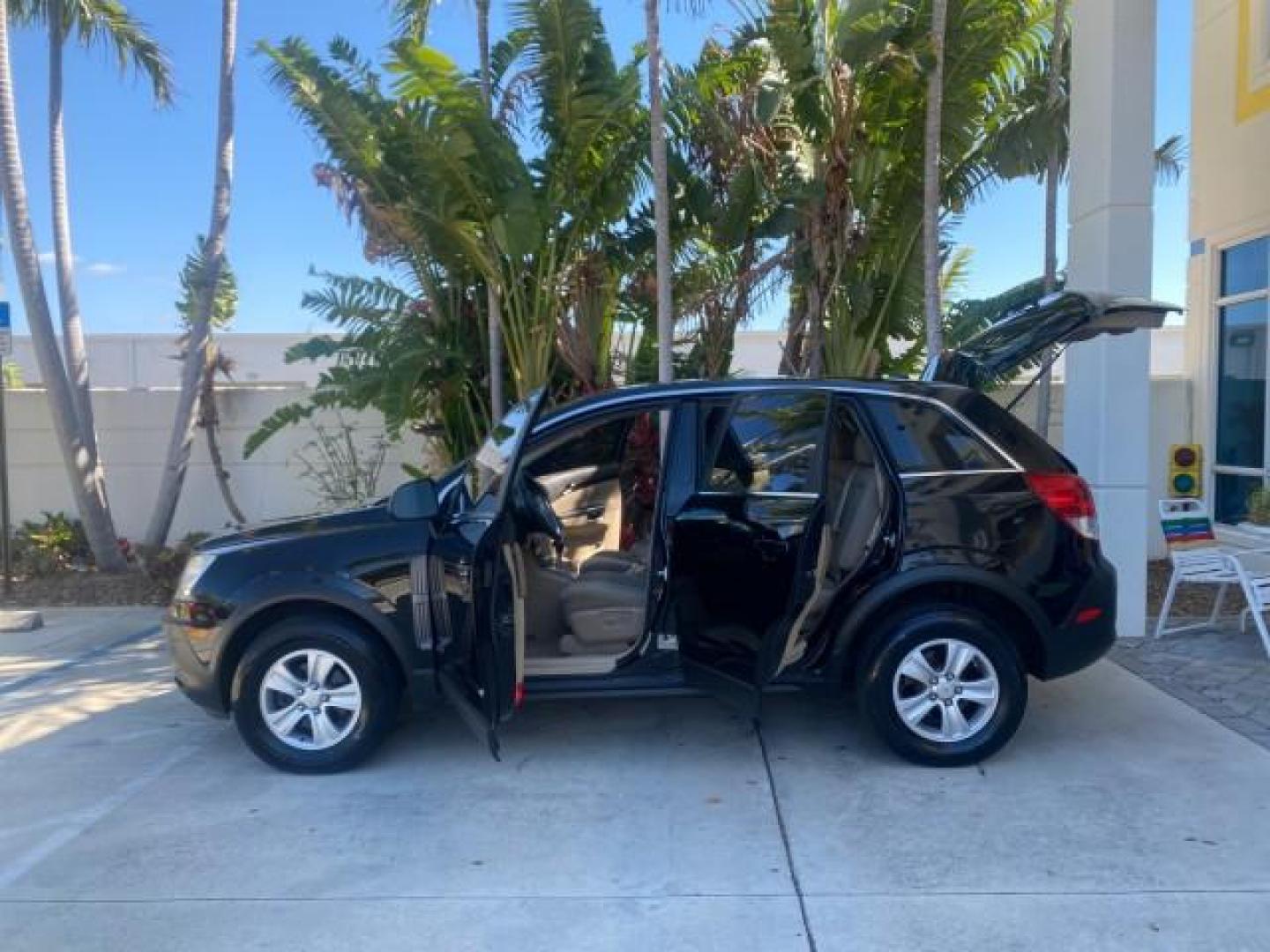 2008 Black Onyx /Tan Saturn VUE XE 1 OWNER FL LOW MILES 56,371 (3GSCL33P28S) with an Ecotec 2.4L 4-Cyl MFI Engine engine, Automatic transmission, located at 4701 North Dixie Hwy, Pompano Beach, FL, 33064, (954) 422-2889, 26.240938, -80.123474 - OUR WEBPAGE FLORIDACARS1.COM HAS OVER 100 PHOTOS AND FREE CARFAX LINK 2008 SATURN VUE XE VIN: 3GSCL33P28S503617 3 G S C L 3 3 P 2 8 S 5 0 3 6 1 7 4 DOOR WAGON/SPORT UTILITY 2.4L I4 F 26 MPG GASOLINE FRONT WHEEL DRIVE Top Features Alloy Wheels Cloth Seats Satellite Radio Ready Basic Features ABS Brak - Photo#8