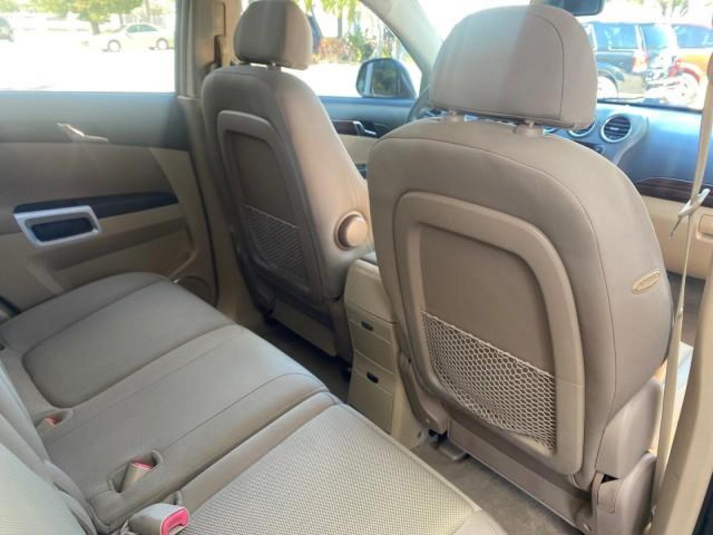 2008 Black Onyx /Tan Saturn VUE XE 1 OWNER FL LOW MILES 56,371 (3GSCL33P28S) with an Ecotec 2.4L 4-Cyl MFI Engine engine, Automatic transmission, located at 4701 North Dixie Hwy, Pompano Beach, FL, 33064, (954) 422-2889, 26.240938, -80.123474 - OUR WEBPAGE FLORIDACARS1.COM HAS OVER 100 PHOTOS AND FREE CARFAX LINK 2008 SATURN VUE XE VIN: 3GSCL33P28S503617 3 G S C L 3 3 P 2 8 S 5 0 3 6 1 7 4 DOOR WAGON/SPORT UTILITY 2.4L I4 F 26 MPG GASOLINE FRONT WHEEL DRIVE Top Features Alloy Wheels Cloth Seats Satellite Radio Ready Basic Features ABS Brak - Photo#90