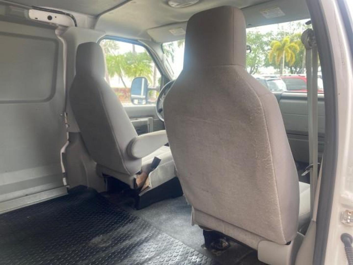 2010 Oxford White /Medium Flint Ford Econoline Cargo Van ext. low miles 54,224 (1FTSS3EL1AD) with an 5.4L SOHC EFI Flex-Fuel V8 Engine engine, Automatic transmission, located at 4701 North Dixie Hwy, Pompano Beach, FL, 33064, (954) 422-2889, 26.240938, -80.123474 - OUR WEBPAGE FLORIDACARS1.COM HAS OVER 100 PHOTOS AND FREE CARFAX LINK 2010 FORD E-SERIES E-350 SD EXT HARD TO FIND! VIN: 1FTSS3EL1ADA67398 1 F T S S 3 E L 1 A D A 6 7 3 9 8 VAN 5.4L V8 F SOHC 16V GASOLINE DUAL AC RARE OPTION. REAR WHEEL DRIVE Top Features Cloth Seats Basic Features ABS Brakes Air Co - Photo#99