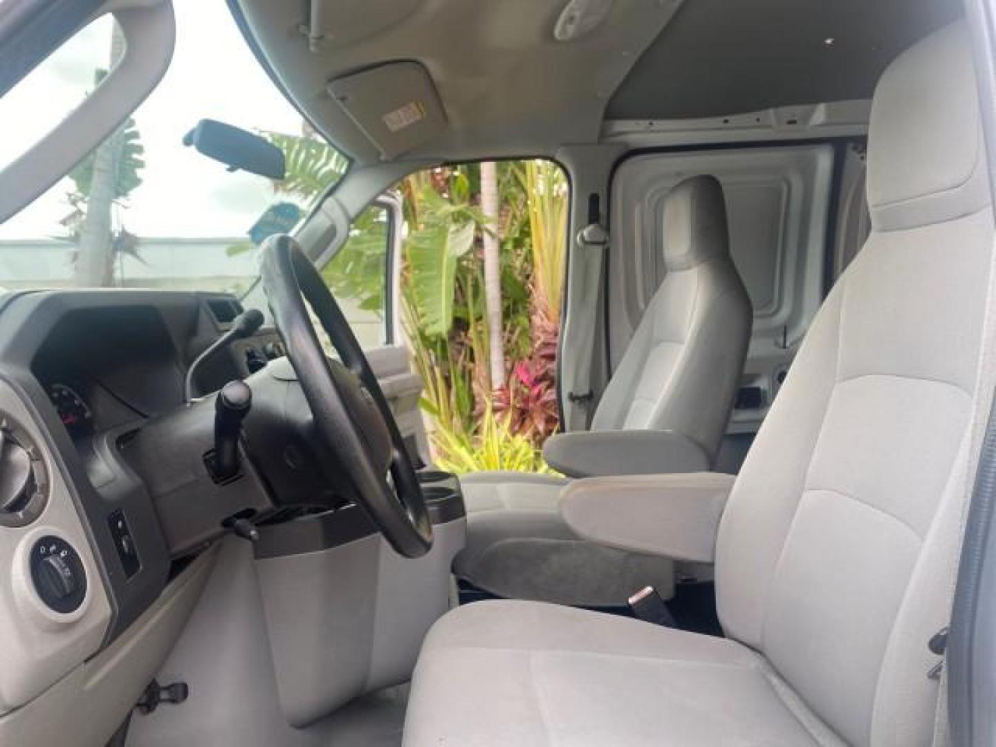 2010 Oxford White /Medium Flint Ford Econoline Cargo Van ext. low miles 54,224 (1FTSS3EL1AD) with an 5.4L SOHC EFI Flex-Fuel V8 Engine engine, Automatic transmission, located at 4701 North Dixie Hwy, Pompano Beach, FL, 33064, (954) 422-2889, 26.240938, -80.123474 - OUR WEBPAGE FLORIDACARS1.COM HAS OVER 100 PHOTOS AND FREE CARFAX LINK 2010 FORD E-SERIES E-350 SD EXT HARD TO FIND! VIN: 1FTSS3EL1ADA67398 1 F T S S 3 E L 1 A D A 6 7 3 9 8 VAN 5.4L V8 F SOHC 16V GASOLINE DUAL AC RARE OPTION. REAR WHEEL DRIVE Top Features Cloth Seats Basic Features ABS Brakes Air Co - Photo#10