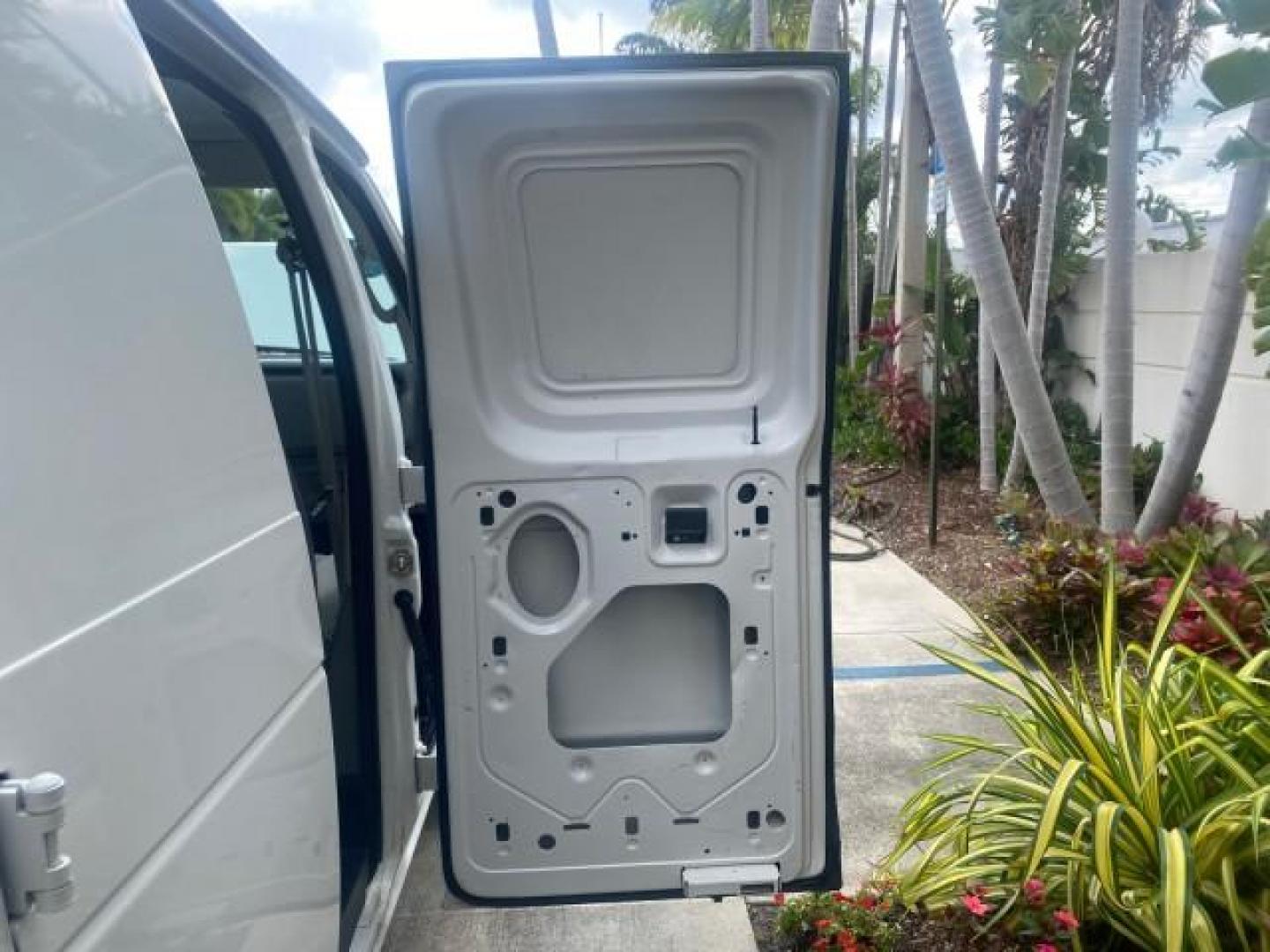 2010 Oxford White /Medium Flint Ford Econoline Cargo Van ext. low miles 54,224 (1FTSS3EL1AD) with an 5.4L SOHC EFI Flex-Fuel V8 Engine engine, Automatic transmission, located at 4701 North Dixie Hwy, Pompano Beach, FL, 33064, (954) 422-2889, 26.240938, -80.123474 - OUR WEBPAGE FLORIDACARS1.COM HAS OVER 100 PHOTOS AND FREE CARFAX LINK 2010 FORD E-SERIES E-350 SD EXT HARD TO FIND! VIN: 1FTSS3EL1ADA67398 1 F T S S 3 E L 1 A D A 6 7 3 9 8 VAN 5.4L V8 F SOHC 16V GASOLINE DUAL AC RARE OPTION. REAR WHEEL DRIVE Top Features Cloth Seats Basic Features ABS Brakes Air Co - Photo#13