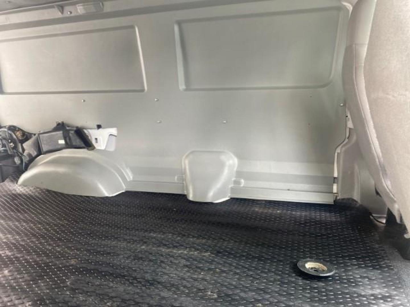 2010 Oxford White /Medium Flint Ford Econoline Cargo Van ext. low miles 54,224 (1FTSS3EL1AD) with an 5.4L SOHC EFI Flex-Fuel V8 Engine engine, Automatic transmission, located at 4701 North Dixie Hwy, Pompano Beach, FL, 33064, (954) 422-2889, 26.240938, -80.123474 - OUR WEBPAGE FLORIDACARS1.COM HAS OVER 100 PHOTOS AND FREE CARFAX LINK 2010 FORD E-SERIES E-350 SD EXT HARD TO FIND! VIN: 1FTSS3EL1ADA67398 1 F T S S 3 E L 1 A D A 6 7 3 9 8 VAN 5.4L V8 F SOHC 16V GASOLINE DUAL AC RARE OPTION. REAR WHEEL DRIVE Top Features Cloth Seats Basic Features ABS Brakes Air Co - Photo#14