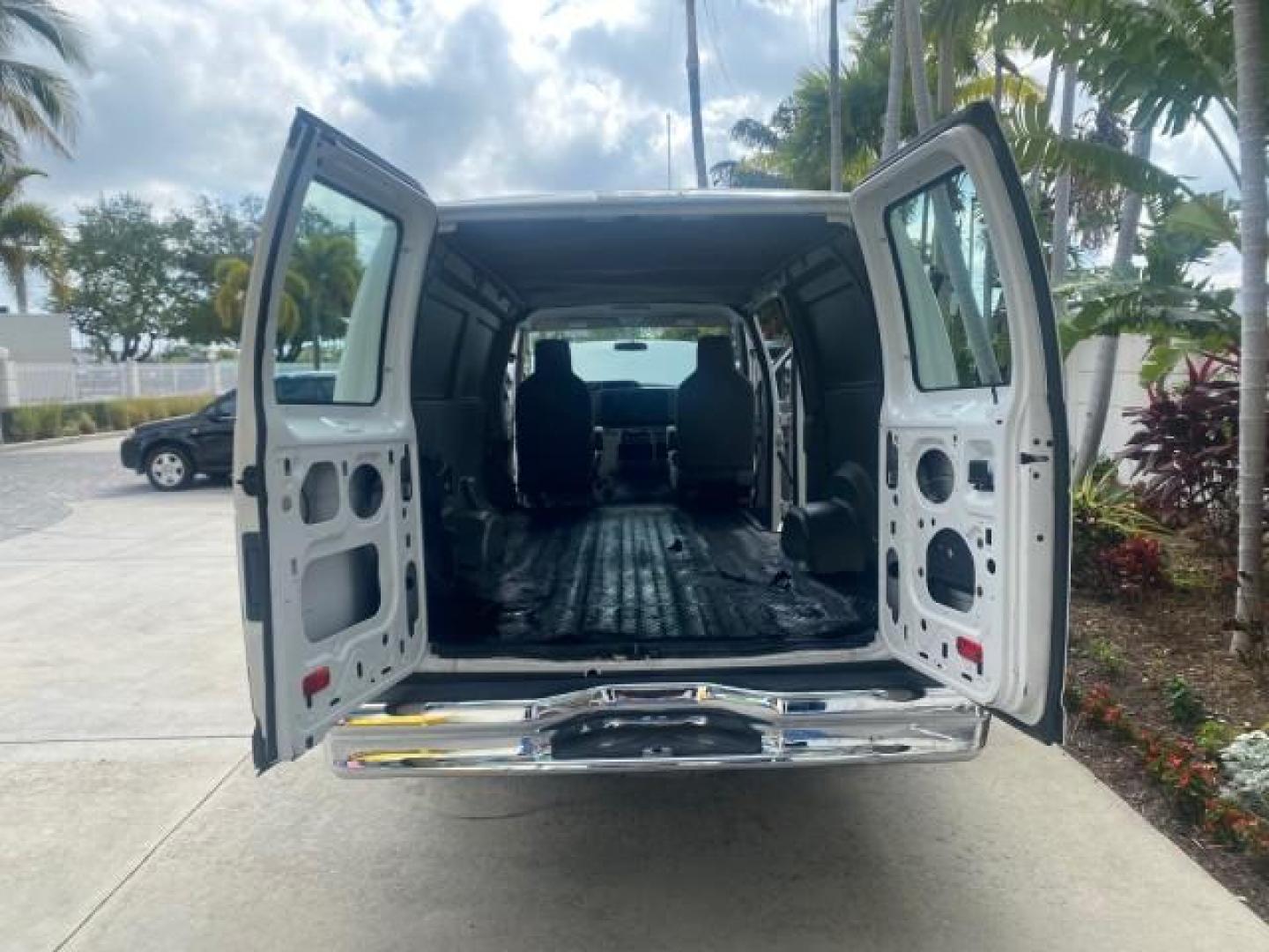 2010 Oxford White /Medium Flint Ford Econoline Cargo Van ext. low miles 54,224 (1FTSS3EL1AD) with an 5.4L SOHC EFI Flex-Fuel V8 Engine engine, Automatic transmission, located at 4701 North Dixie Hwy, Pompano Beach, FL, 33064, (954) 422-2889, 26.240938, -80.123474 - OUR WEBPAGE FLORIDACARS1.COM HAS OVER 100 PHOTOS AND FREE CARFAX LINK 2010 FORD E-SERIES E-350 SD EXT HARD TO FIND! VIN: 1FTSS3EL1ADA67398 1 F T S S 3 E L 1 A D A 6 7 3 9 8 VAN 5.4L V8 F SOHC 16V GASOLINE DUAL AC RARE OPTION. REAR WHEEL DRIVE Top Features Cloth Seats Basic Features ABS Brakes Air Co - Photo#15