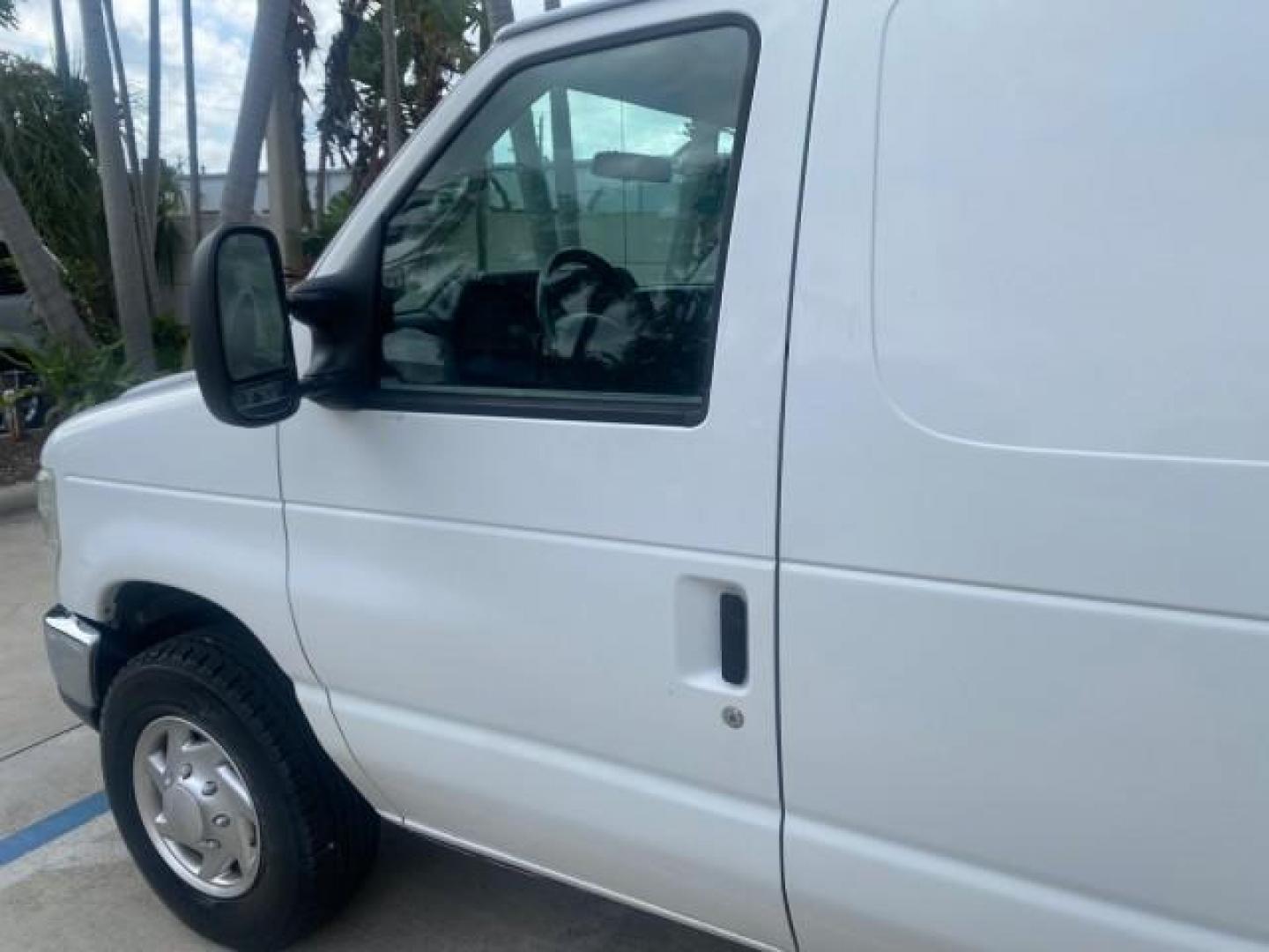 2010 Oxford White /Medium Flint Ford Econoline Cargo Van ext. low miles 54,224 (1FTSS3EL1AD) with an 5.4L SOHC EFI Flex-Fuel V8 Engine engine, Automatic transmission, located at 4701 North Dixie Hwy, Pompano Beach, FL, 33064, (954) 422-2889, 26.240938, -80.123474 - OUR WEBPAGE FLORIDACARS1.COM HAS OVER 100 PHOTOS AND FREE CARFAX LINK 2010 FORD E-SERIES E-350 SD EXT HARD TO FIND! VIN: 1FTSS3EL1ADA67398 1 F T S S 3 E L 1 A D A 6 7 3 9 8 VAN 5.4L V8 F SOHC 16V GASOLINE DUAL AC RARE OPTION. REAR WHEEL DRIVE Top Features Cloth Seats Basic Features ABS Brakes Air Co - Photo#26