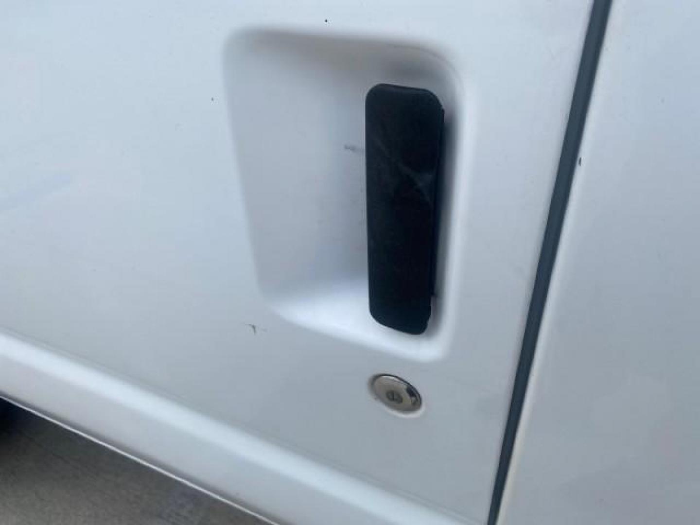 2010 Oxford White /Medium Flint Ford Econoline Cargo Van ext. low miles 54,224 (1FTSS3EL1AD) with an 5.4L SOHC EFI Flex-Fuel V8 Engine engine, Automatic transmission, located at 4701 North Dixie Hwy, Pompano Beach, FL, 33064, (954) 422-2889, 26.240938, -80.123474 - OUR WEBPAGE FLORIDACARS1.COM HAS OVER 100 PHOTOS AND FREE CARFAX LINK 2010 FORD E-SERIES E-350 SD EXT HARD TO FIND! VIN: 1FTSS3EL1ADA67398 1 F T S S 3 E L 1 A D A 6 7 3 9 8 VAN 5.4L V8 F SOHC 16V GASOLINE DUAL AC RARE OPTION. REAR WHEEL DRIVE Top Features Cloth Seats Basic Features ABS Brakes Air Co - Photo#27
