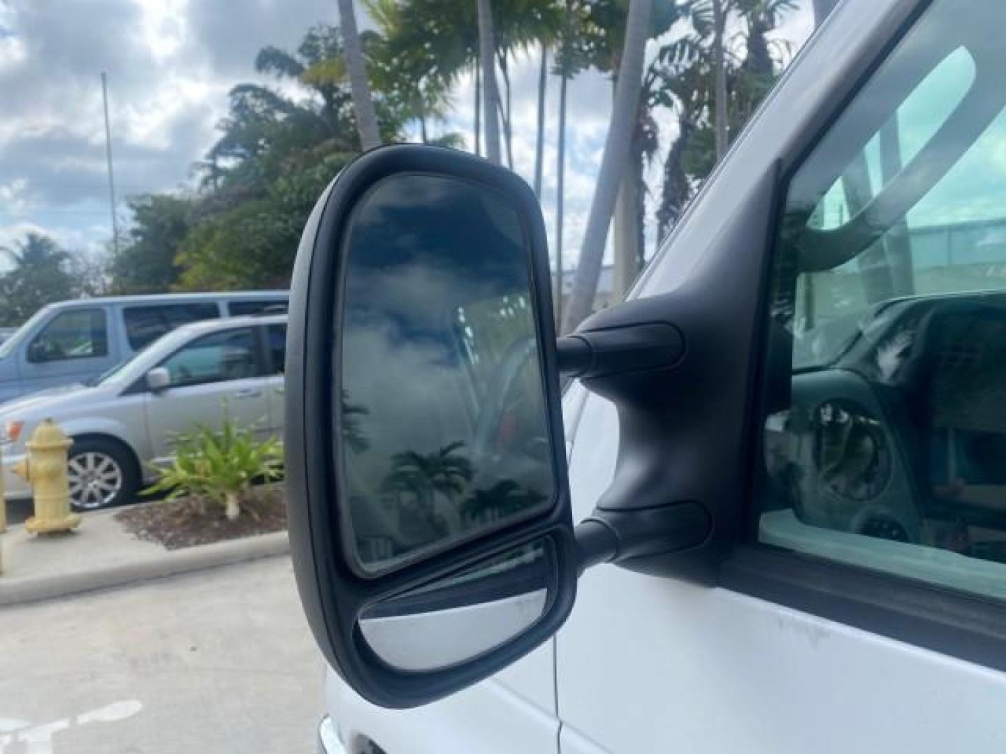 2010 Oxford White /Medium Flint Ford Econoline Cargo Van ext. low miles 54,224 (1FTSS3EL1AD) with an 5.4L SOHC EFI Flex-Fuel V8 Engine engine, Automatic transmission, located at 4701 North Dixie Hwy, Pompano Beach, FL, 33064, (954) 422-2889, 26.240938, -80.123474 - OUR WEBPAGE FLORIDACARS1.COM HAS OVER 100 PHOTOS AND FREE CARFAX LINK 2010 FORD E-SERIES E-350 SD EXT HARD TO FIND! VIN: 1FTSS3EL1ADA67398 1 F T S S 3 E L 1 A D A 6 7 3 9 8 VAN 5.4L V8 F SOHC 16V GASOLINE DUAL AC RARE OPTION. REAR WHEEL DRIVE Top Features Cloth Seats Basic Features ABS Brakes Air Co - Photo#28