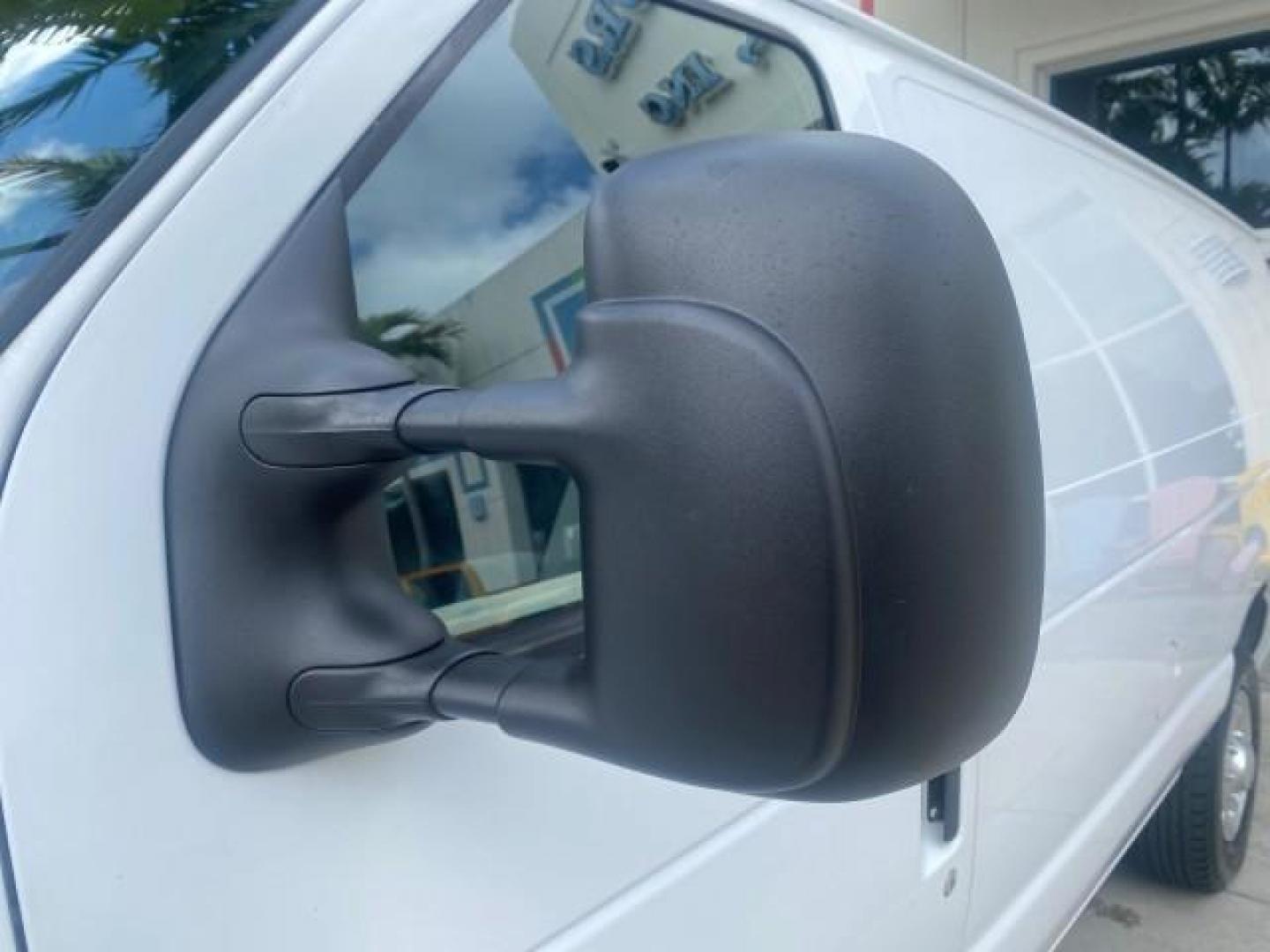 2010 Oxford White /Medium Flint Ford Econoline Cargo Van ext. low miles 54,224 (1FTSS3EL1AD) with an 5.4L SOHC EFI Flex-Fuel V8 Engine engine, Automatic transmission, located at 4701 North Dixie Hwy, Pompano Beach, FL, 33064, (954) 422-2889, 26.240938, -80.123474 - OUR WEBPAGE FLORIDACARS1.COM HAS OVER 100 PHOTOS AND FREE CARFAX LINK 2010 FORD E-SERIES E-350 SD EXT HARD TO FIND! VIN: 1FTSS3EL1ADA67398 1 F T S S 3 E L 1 A D A 6 7 3 9 8 VAN 5.4L V8 F SOHC 16V GASOLINE DUAL AC RARE OPTION. REAR WHEEL DRIVE Top Features Cloth Seats Basic Features ABS Brakes Air Co - Photo#29