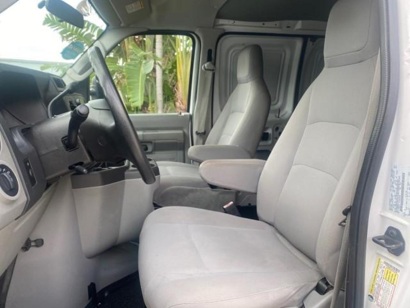 2010 Oxford White /Medium Flint Ford Econoline Cargo Van ext. low miles 54,224 (1FTSS3EL1AD) with an 5.4L SOHC EFI Flex-Fuel V8 Engine engine, Automatic transmission, located at 4701 North Dixie Hwy, Pompano Beach, FL, 33064, (954) 422-2889, 26.240938, -80.123474 - OUR WEBPAGE FLORIDACARS1.COM HAS OVER 100 PHOTOS AND FREE CARFAX LINK 2010 FORD E-SERIES E-350 SD EXT HARD TO FIND! VIN: 1FTSS3EL1ADA67398 1 F T S S 3 E L 1 A D A 6 7 3 9 8 VAN 5.4L V8 F SOHC 16V GASOLINE DUAL AC RARE OPTION. REAR WHEEL DRIVE Top Features Cloth Seats Basic Features ABS Brakes Air Co - Photo#33