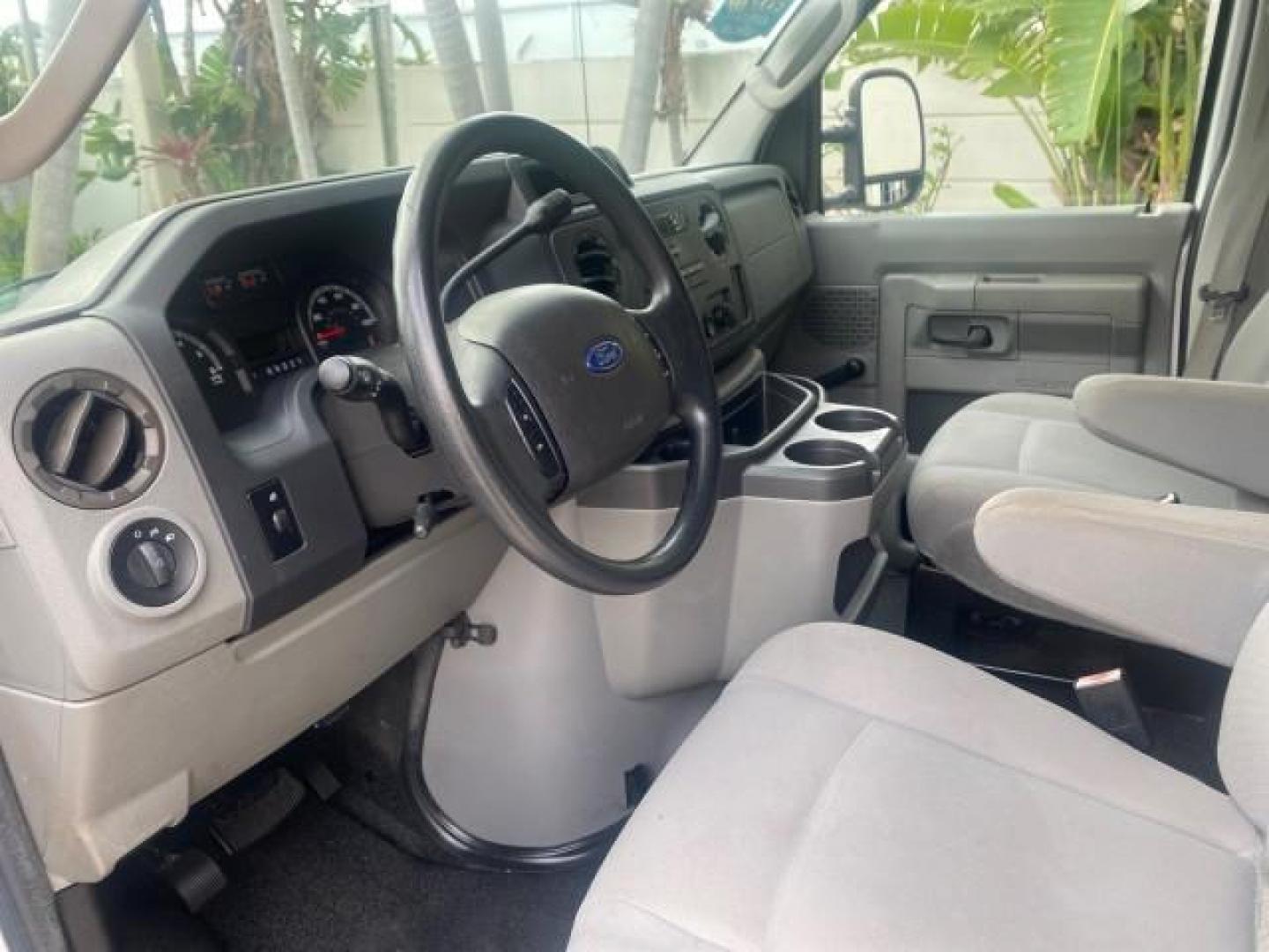 2010 Oxford White /Medium Flint Ford Econoline Cargo Van ext. low miles 54,224 (1FTSS3EL1AD) with an 5.4L SOHC EFI Flex-Fuel V8 Engine engine, Automatic transmission, located at 4701 North Dixie Hwy, Pompano Beach, FL, 33064, (954) 422-2889, 26.240938, -80.123474 - OUR WEBPAGE FLORIDACARS1.COM HAS OVER 100 PHOTOS AND FREE CARFAX LINK 2010 FORD E-SERIES E-350 SD EXT HARD TO FIND! VIN: 1FTSS3EL1ADA67398 1 F T S S 3 E L 1 A D A 6 7 3 9 8 VAN 5.4L V8 F SOHC 16V GASOLINE DUAL AC RARE OPTION. REAR WHEEL DRIVE Top Features Cloth Seats Basic Features ABS Brakes Air Co - Photo#34