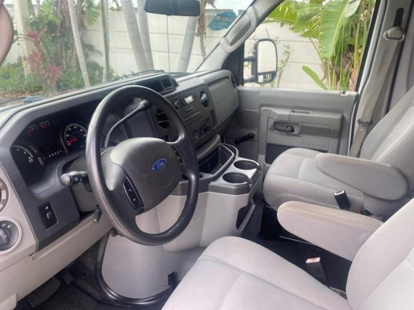 2010 Oxford White /Medium Flint Ford Econoline Cargo Van ext. low miles 54,224 (1FTSS3EL1AD) with an 5.4L SOHC EFI Flex-Fuel V8 Engine engine, Automatic transmission, located at 4701 North Dixie Hwy, Pompano Beach, FL, 33064, (954) 422-2889, 26.240938, -80.123474 - OUR WEBPAGE FLORIDACARS1.COM HAS OVER 100 PHOTOS AND FREE CARFAX LINK 2010 FORD E-SERIES E-350 SD EXT HARD TO FIND! VIN: 1FTSS3EL1ADA67398 1 F T S S 3 E L 1 A D A 6 7 3 9 8 VAN 5.4L V8 F SOHC 16V GASOLINE DUAL AC RARE OPTION. REAR WHEEL DRIVE Top Features Cloth Seats Basic Features ABS Brakes Air Co - Photo#35