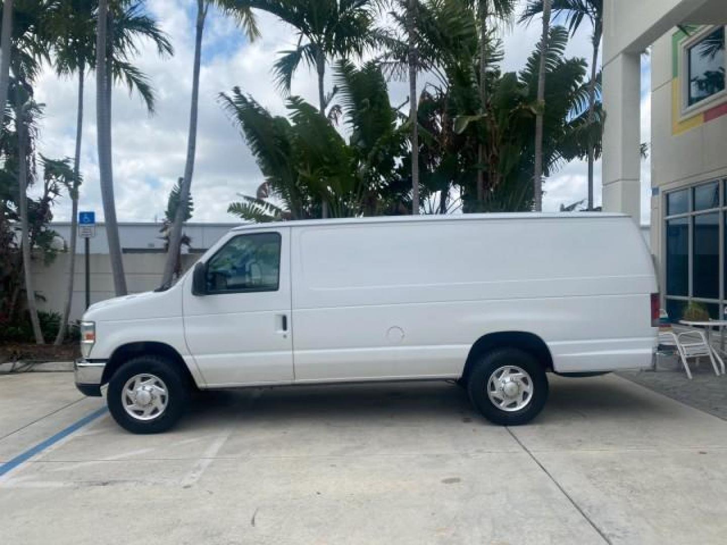2010 Oxford White /Medium Flint Ford Econoline Cargo Van ext. low miles 54,224 (1FTSS3EL1AD) with an 5.4L SOHC EFI Flex-Fuel V8 Engine engine, Automatic transmission, located at 4701 North Dixie Hwy, Pompano Beach, FL, 33064, (954) 422-2889, 26.240938, -80.123474 - OUR WEBPAGE FLORIDACARS1.COM HAS OVER 100 PHOTOS AND FREE CARFAX LINK 2010 FORD E-SERIES E-350 SD EXT HARD TO FIND! VIN: 1FTSS3EL1ADA67398 1 F T S S 3 E L 1 A D A 6 7 3 9 8 VAN 5.4L V8 F SOHC 16V GASOLINE DUAL AC RARE OPTION. REAR WHEEL DRIVE Top Features Cloth Seats Basic Features ABS Brakes Air Co - Photo#4