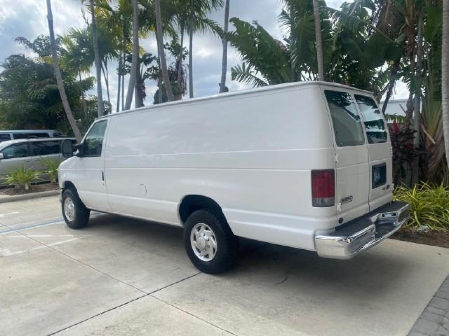 2010 Oxford White /Medium Flint Ford Econoline Cargo Van ext. low miles 54,224 (1FTSS3EL1AD) with an 5.4L SOHC EFI Flex-Fuel V8 Engine engine, Automatic transmission, located at 4701 North Dixie Hwy, Pompano Beach, FL, 33064, (954) 422-2889, 26.240938, -80.123474 - OUR WEBPAGE FLORIDACARS1.COM HAS OVER 100 PHOTOS AND FREE CARFAX LINK 2010 FORD E-SERIES E-350 SD EXT HARD TO FIND! VIN: 1FTSS3EL1ADA67398 1 F T S S 3 E L 1 A D A 6 7 3 9 8 VAN 5.4L V8 F SOHC 16V GASOLINE DUAL AC RARE OPTION. REAR WHEEL DRIVE Top Features Cloth Seats Basic Features ABS Brakes Air Co - Photo#5