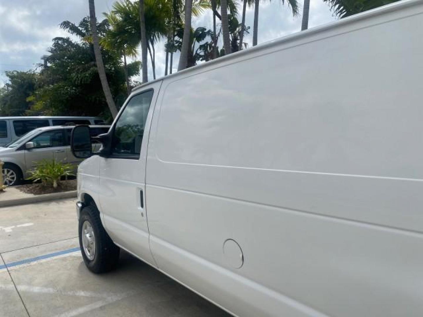 2010 Oxford White /Medium Flint Ford Econoline Cargo Van ext. low miles 54,224 (1FTSS3EL1AD) with an 5.4L SOHC EFI Flex-Fuel V8 Engine engine, Automatic transmission, located at 4701 North Dixie Hwy, Pompano Beach, FL, 33064, (954) 422-2889, 26.240938, -80.123474 - OUR WEBPAGE FLORIDACARS1.COM HAS OVER 100 PHOTOS AND FREE CARFAX LINK 2010 FORD E-SERIES E-350 SD EXT HARD TO FIND! VIN: 1FTSS3EL1ADA67398 1 F T S S 3 E L 1 A D A 6 7 3 9 8 VAN 5.4L V8 F SOHC 16V GASOLINE DUAL AC RARE OPTION. REAR WHEEL DRIVE Top Features Cloth Seats Basic Features ABS Brakes Air Co - Photo#60