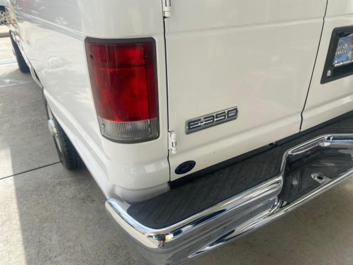 2010 Oxford White /Medium Flint Ford Econoline Cargo Van ext. low miles 54,224 (1FTSS3EL1AD) with an 5.4L SOHC EFI Flex-Fuel V8 Engine engine, Automatic transmission, located at 4701 North Dixie Hwy, Pompano Beach, FL, 33064, (954) 422-2889, 26.240938, -80.123474 - OUR WEBPAGE FLORIDACARS1.COM HAS OVER 100 PHOTOS AND FREE CARFAX LINK 2010 FORD E-SERIES E-350 SD EXT HARD TO FIND! VIN: 1FTSS3EL1ADA67398 1 F T S S 3 E L 1 A D A 6 7 3 9 8 VAN 5.4L V8 F SOHC 16V GASOLINE DUAL AC RARE OPTION. REAR WHEEL DRIVE Top Features Cloth Seats Basic Features ABS Brakes Air Co - Photo#62