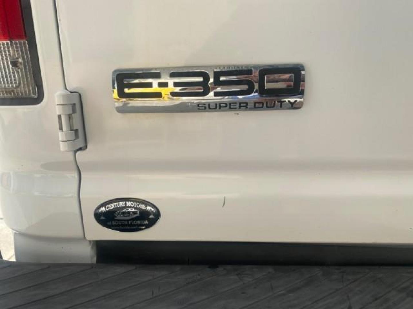 2010 Oxford White /Medium Flint Ford Econoline Cargo Van ext. low miles 54,224 (1FTSS3EL1AD) with an 5.4L SOHC EFI Flex-Fuel V8 Engine engine, Automatic transmission, located at 4701 North Dixie Hwy, Pompano Beach, FL, 33064, (954) 422-2889, 26.240938, -80.123474 - OUR WEBPAGE FLORIDACARS1.COM HAS OVER 100 PHOTOS AND FREE CARFAX LINK 2010 FORD E-SERIES E-350 SD EXT HARD TO FIND! VIN: 1FTSS3EL1ADA67398 1 F T S S 3 E L 1 A D A 6 7 3 9 8 VAN 5.4L V8 F SOHC 16V GASOLINE DUAL AC RARE OPTION. REAR WHEEL DRIVE Top Features Cloth Seats Basic Features ABS Brakes Air Co - Photo#64