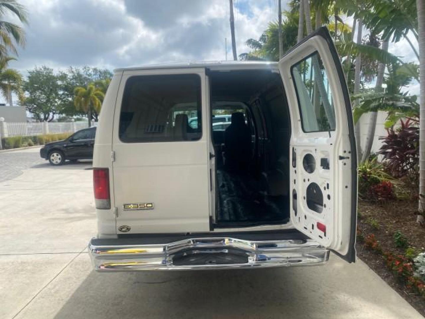 2010 Oxford White /Medium Flint Ford Econoline Cargo Van ext. low miles 54,224 (1FTSS3EL1AD) with an 5.4L SOHC EFI Flex-Fuel V8 Engine engine, Automatic transmission, located at 4701 North Dixie Hwy, Pompano Beach, FL, 33064, (954) 422-2889, 26.240938, -80.123474 - OUR WEBPAGE FLORIDACARS1.COM HAS OVER 100 PHOTOS AND FREE CARFAX LINK 2010 FORD E-SERIES E-350 SD EXT HARD TO FIND! VIN: 1FTSS3EL1ADA67398 1 F T S S 3 E L 1 A D A 6 7 3 9 8 VAN 5.4L V8 F SOHC 16V GASOLINE DUAL AC RARE OPTION. REAR WHEEL DRIVE Top Features Cloth Seats Basic Features ABS Brakes Air Co - Photo#66