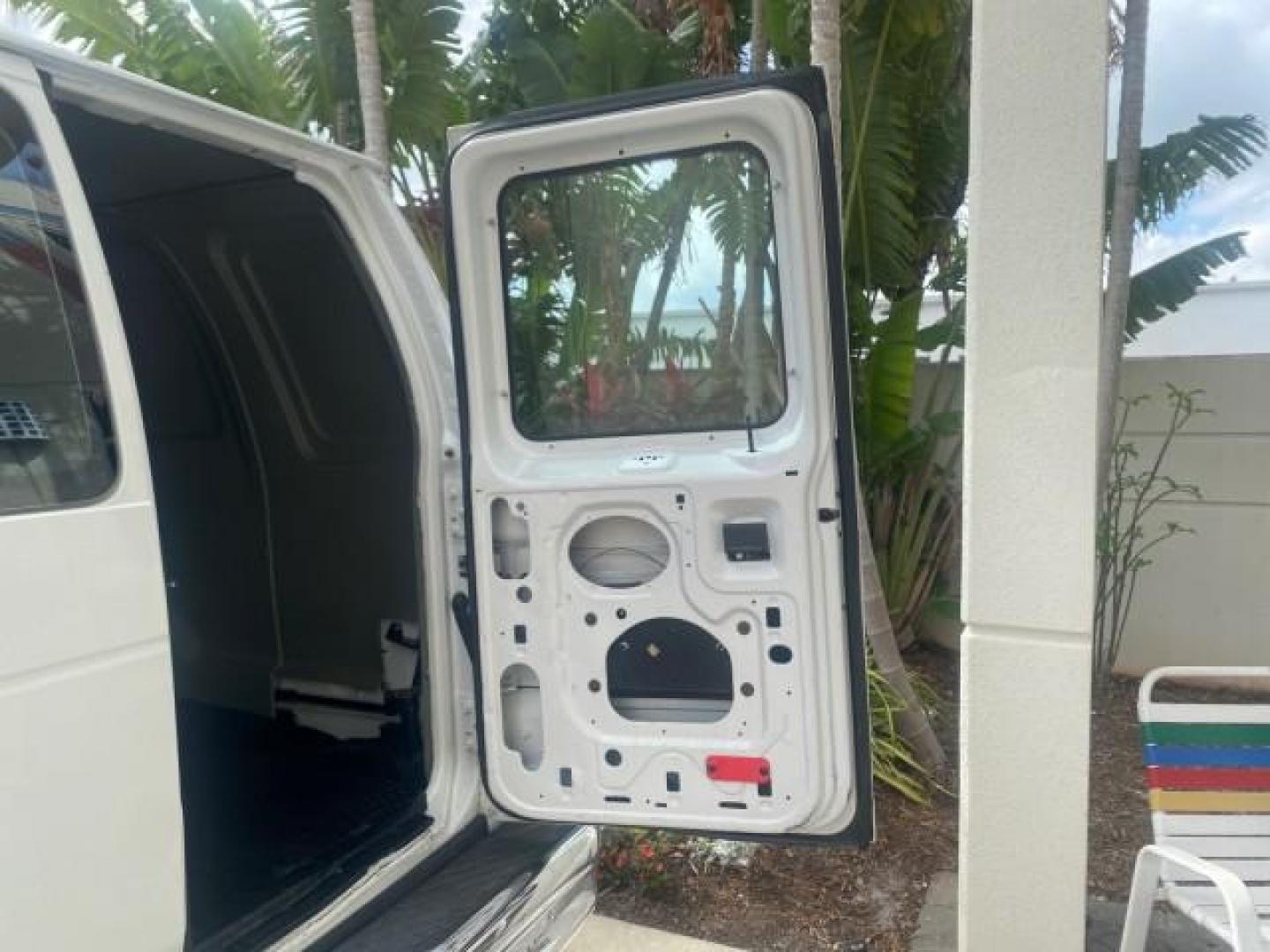 2010 Oxford White /Medium Flint Ford Econoline Cargo Van ext. low miles 54,224 (1FTSS3EL1AD) with an 5.4L SOHC EFI Flex-Fuel V8 Engine engine, Automatic transmission, located at 4701 North Dixie Hwy, Pompano Beach, FL, 33064, (954) 422-2889, 26.240938, -80.123474 - OUR WEBPAGE FLORIDACARS1.COM HAS OVER 100 PHOTOS AND FREE CARFAX LINK 2010 FORD E-SERIES E-350 SD EXT HARD TO FIND! VIN: 1FTSS3EL1ADA67398 1 F T S S 3 E L 1 A D A 6 7 3 9 8 VAN 5.4L V8 F SOHC 16V GASOLINE DUAL AC RARE OPTION. REAR WHEEL DRIVE Top Features Cloth Seats Basic Features ABS Brakes Air Co - Photo#67
