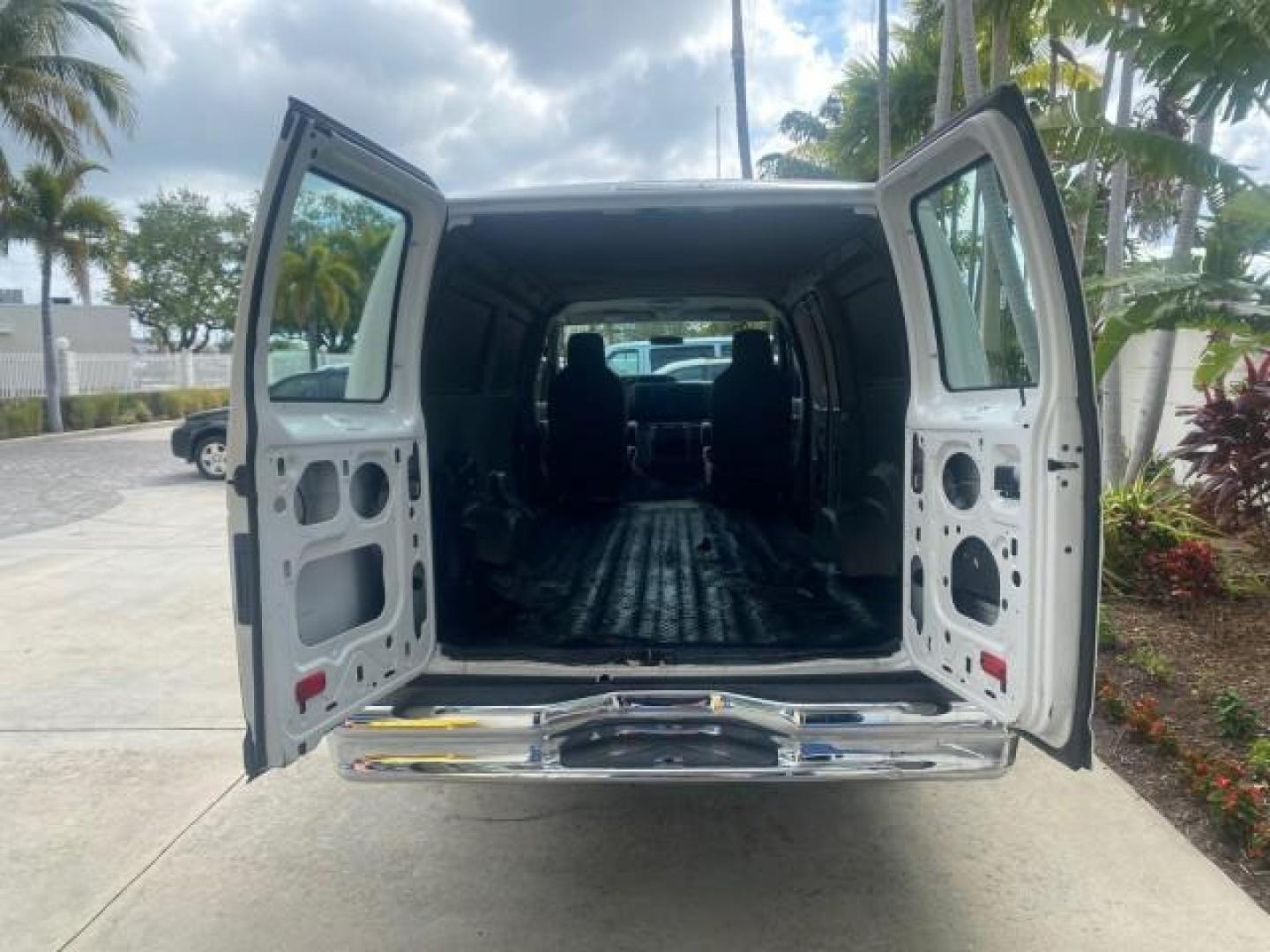 2010 Oxford White /Medium Flint Ford Econoline Cargo Van ext. low miles 54,224 (1FTSS3EL1AD) with an 5.4L SOHC EFI Flex-Fuel V8 Engine engine, Automatic transmission, located at 4701 North Dixie Hwy, Pompano Beach, FL, 33064, (954) 422-2889, 26.240938, -80.123474 - OUR WEBPAGE FLORIDACARS1.COM HAS OVER 100 PHOTOS AND FREE CARFAX LINK 2010 FORD E-SERIES E-350 SD EXT HARD TO FIND! VIN: 1FTSS3EL1ADA67398 1 F T S S 3 E L 1 A D A 6 7 3 9 8 VAN 5.4L V8 F SOHC 16V GASOLINE DUAL AC RARE OPTION. REAR WHEEL DRIVE Top Features Cloth Seats Basic Features ABS Brakes Air Co - Photo#68