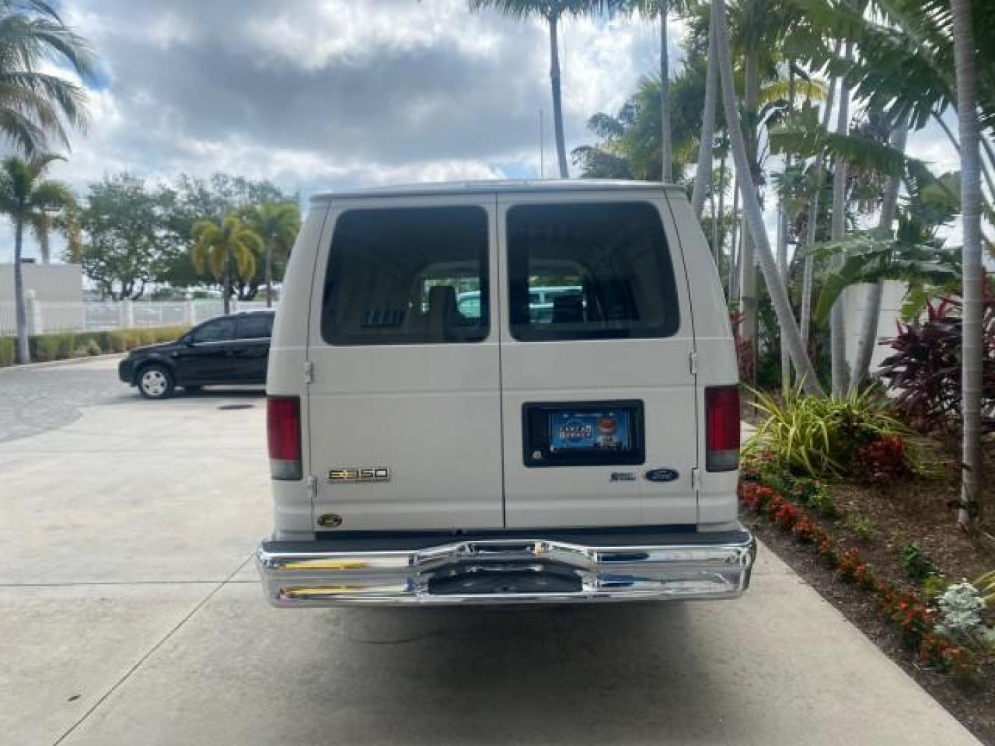 2010 Oxford White /Medium Flint Ford Econoline Cargo Van ext. low miles 54,224 (1FTSS3EL1AD) with an 5.4L SOHC EFI Flex-Fuel V8 Engine engine, Automatic transmission, located at 4701 North Dixie Hwy, Pompano Beach, FL, 33064, (954) 422-2889, 26.240938, -80.123474 - OUR WEBPAGE FLORIDACARS1.COM HAS OVER 100 PHOTOS AND FREE CARFAX LINK 2010 FORD E-SERIES E-350 SD EXT HARD TO FIND! VIN: 1FTSS3EL1ADA67398 1 F T S S 3 E L 1 A D A 6 7 3 9 8 VAN 5.4L V8 F SOHC 16V GASOLINE DUAL AC RARE OPTION. REAR WHEEL DRIVE Top Features Cloth Seats Basic Features ABS Brakes Air Co - Photo#6