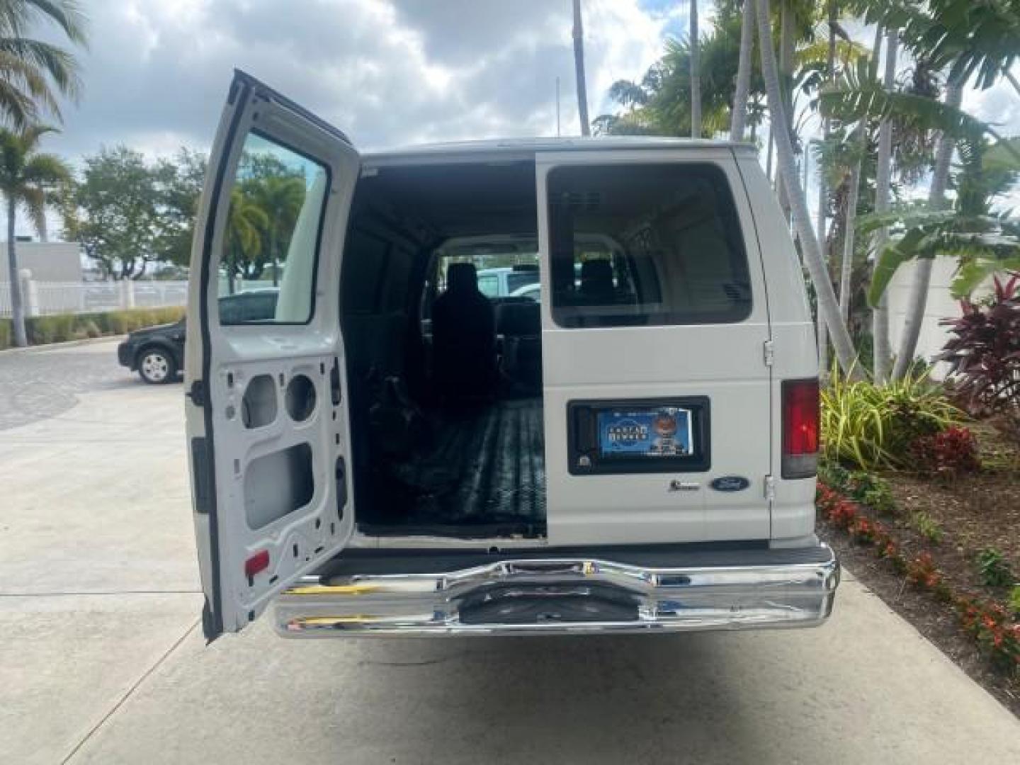 2010 Oxford White /Medium Flint Ford Econoline Cargo Van ext. low miles 54,224 (1FTSS3EL1AD) with an 5.4L SOHC EFI Flex-Fuel V8 Engine engine, Automatic transmission, located at 4701 North Dixie Hwy, Pompano Beach, FL, 33064, (954) 422-2889, 26.240938, -80.123474 - OUR WEBPAGE FLORIDACARS1.COM HAS OVER 100 PHOTOS AND FREE CARFAX LINK 2010 FORD E-SERIES E-350 SD EXT HARD TO FIND! VIN: 1FTSS3EL1ADA67398 1 F T S S 3 E L 1 A D A 6 7 3 9 8 VAN 5.4L V8 F SOHC 16V GASOLINE DUAL AC RARE OPTION. REAR WHEEL DRIVE Top Features Cloth Seats Basic Features ABS Brakes Air Co - Photo#70