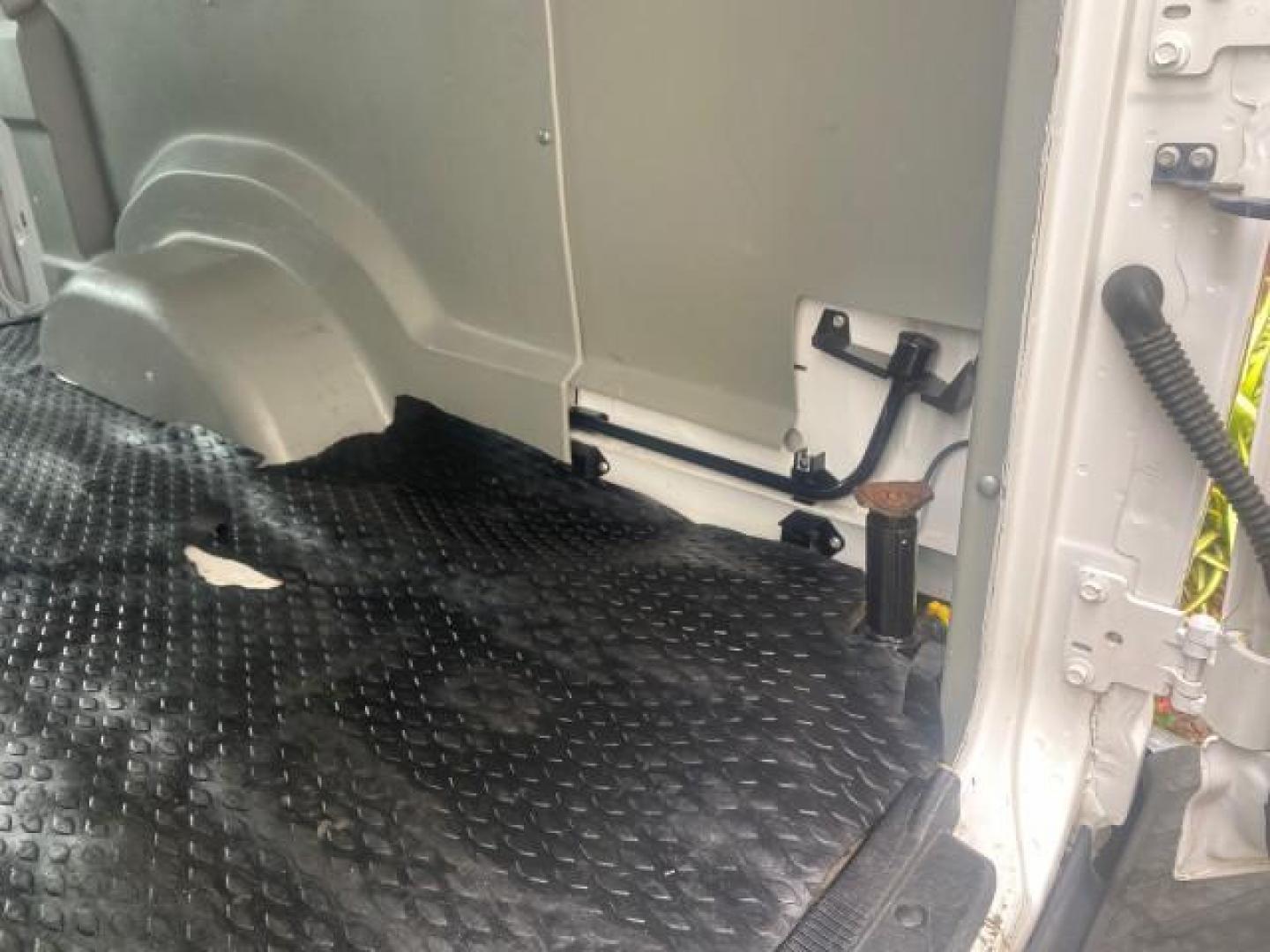 2010 Oxford White /Medium Flint Ford Econoline Cargo Van ext. low miles 54,224 (1FTSS3EL1AD) with an 5.4L SOHC EFI Flex-Fuel V8 Engine engine, Automatic transmission, located at 4701 North Dixie Hwy, Pompano Beach, FL, 33064, (954) 422-2889, 26.240938, -80.123474 - OUR WEBPAGE FLORIDACARS1.COM HAS OVER 100 PHOTOS AND FREE CARFAX LINK 2010 FORD E-SERIES E-350 SD EXT HARD TO FIND! VIN: 1FTSS3EL1ADA67398 1 F T S S 3 E L 1 A D A 6 7 3 9 8 VAN 5.4L V8 F SOHC 16V GASOLINE DUAL AC RARE OPTION. REAR WHEEL DRIVE Top Features Cloth Seats Basic Features ABS Brakes Air Co - Photo#77
