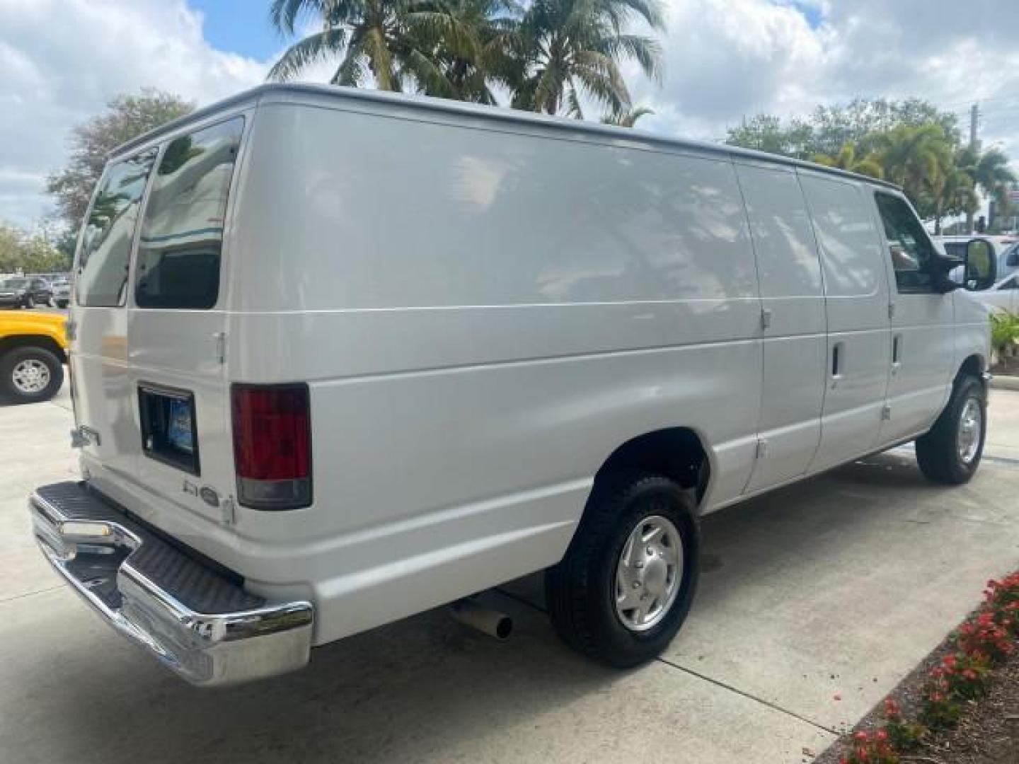 2010 Oxford White /Medium Flint Ford Econoline Cargo Van ext. low miles 54,224 (1FTSS3EL1AD) with an 5.4L SOHC EFI Flex-Fuel V8 Engine engine, Automatic transmission, located at 4701 North Dixie Hwy, Pompano Beach, FL, 33064, (954) 422-2889, 26.240938, -80.123474 - OUR WEBPAGE FLORIDACARS1.COM HAS OVER 100 PHOTOS AND FREE CARFAX LINK 2010 FORD E-SERIES E-350 SD EXT HARD TO FIND! VIN: 1FTSS3EL1ADA67398 1 F T S S 3 E L 1 A D A 6 7 3 9 8 VAN 5.4L V8 F SOHC 16V GASOLINE DUAL AC RARE OPTION. REAR WHEEL DRIVE Top Features Cloth Seats Basic Features ABS Brakes Air Co - Photo#7
