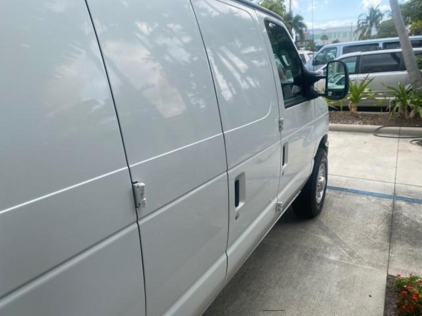 2010 Oxford White /Medium Flint Ford Econoline Cargo Van ext. low miles 54,224 (1FTSS3EL1AD) with an 5.4L SOHC EFI Flex-Fuel V8 Engine engine, Automatic transmission, located at 4701 North Dixie Hwy, Pompano Beach, FL, 33064, (954) 422-2889, 26.240938, -80.123474 - OUR WEBPAGE FLORIDACARS1.COM HAS OVER 100 PHOTOS AND FREE CARFAX LINK 2010 FORD E-SERIES E-350 SD EXT HARD TO FIND! VIN: 1FTSS3EL1ADA67398 1 F T S S 3 E L 1 A D A 6 7 3 9 8 VAN 5.4L V8 F SOHC 16V GASOLINE DUAL AC RARE OPTION. REAR WHEEL DRIVE Top Features Cloth Seats Basic Features ABS Brakes Air Co - Photo#85