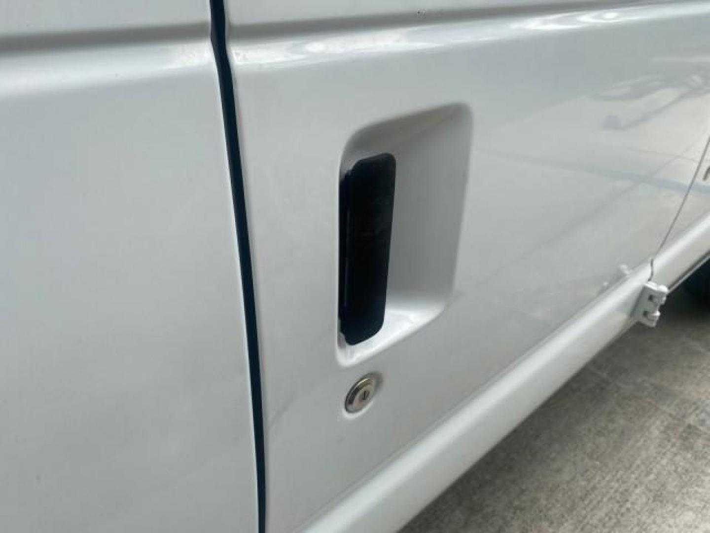 2010 Oxford White /Medium Flint Ford Econoline Cargo Van ext. low miles 54,224 (1FTSS3EL1AD) with an 5.4L SOHC EFI Flex-Fuel V8 Engine engine, Automatic transmission, located at 4701 North Dixie Hwy, Pompano Beach, FL, 33064, (954) 422-2889, 26.240938, -80.123474 - OUR WEBPAGE FLORIDACARS1.COM HAS OVER 100 PHOTOS AND FREE CARFAX LINK 2010 FORD E-SERIES E-350 SD EXT HARD TO FIND! VIN: 1FTSS3EL1ADA67398 1 F T S S 3 E L 1 A D A 6 7 3 9 8 VAN 5.4L V8 F SOHC 16V GASOLINE DUAL AC RARE OPTION. REAR WHEEL DRIVE Top Features Cloth Seats Basic Features ABS Brakes Air Co - Photo#86