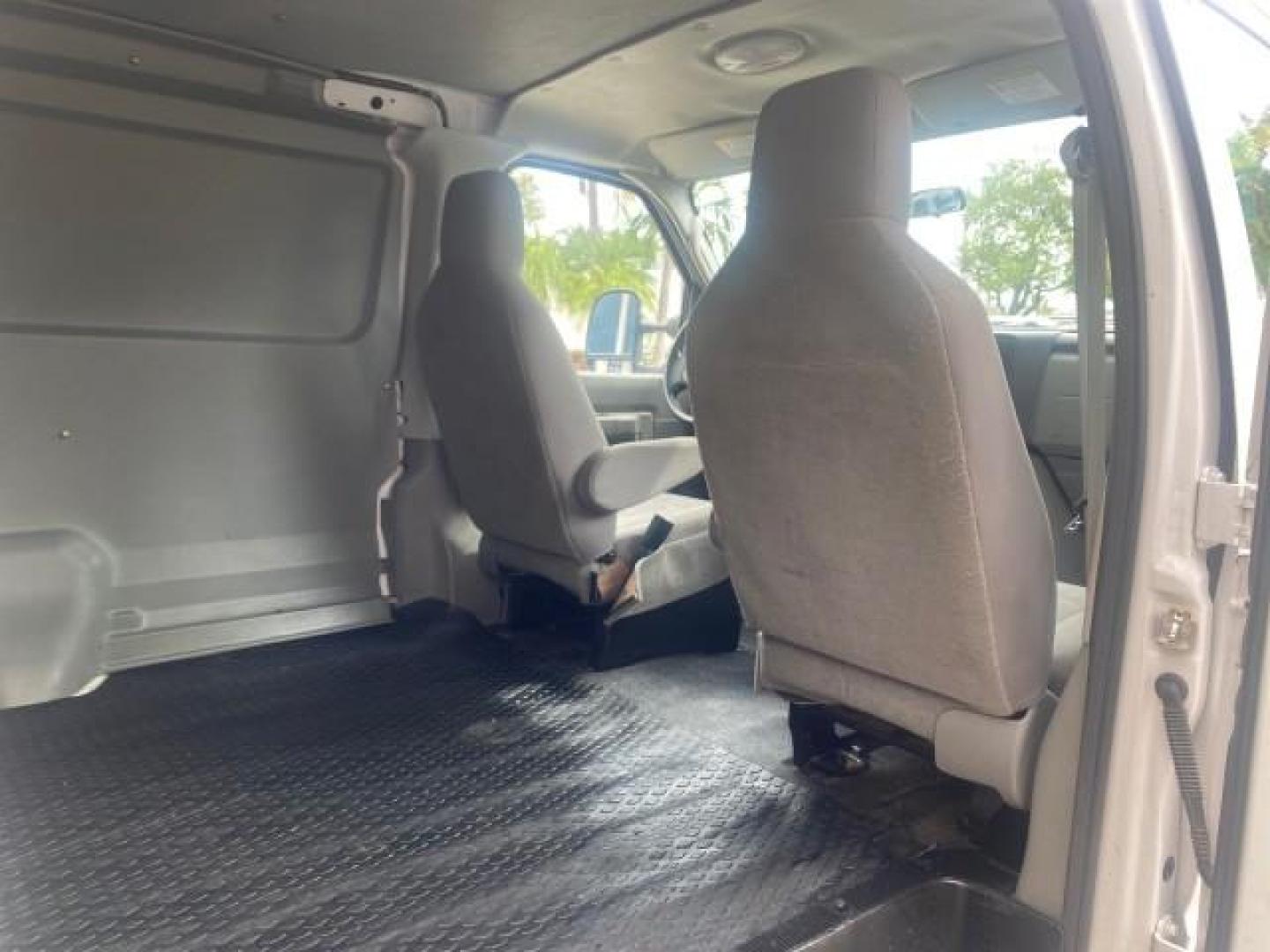 2010 Oxford White /Medium Flint Ford Econoline Cargo Van ext. low miles 54,224 (1FTSS3EL1AD) with an 5.4L SOHC EFI Flex-Fuel V8 Engine engine, Automatic transmission, located at 4701 North Dixie Hwy, Pompano Beach, FL, 33064, (954) 422-2889, 26.240938, -80.123474 - OUR WEBPAGE FLORIDACARS1.COM HAS OVER 100 PHOTOS AND FREE CARFAX LINK 2010 FORD E-SERIES E-350 SD EXT HARD TO FIND! VIN: 1FTSS3EL1ADA67398 1 F T S S 3 E L 1 A D A 6 7 3 9 8 VAN 5.4L V8 F SOHC 16V GASOLINE DUAL AC RARE OPTION. REAR WHEEL DRIVE Top Features Cloth Seats Basic Features ABS Brakes Air Co - Photo#90