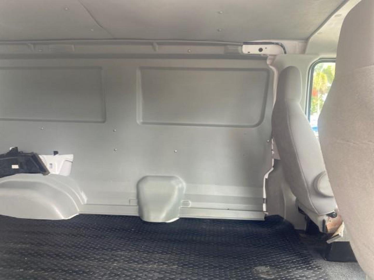 2010 Oxford White /Medium Flint Ford Econoline Cargo Van ext. low miles 54,224 (1FTSS3EL1AD) with an 5.4L SOHC EFI Flex-Fuel V8 Engine engine, Automatic transmission, located at 4701 North Dixie Hwy, Pompano Beach, FL, 33064, (954) 422-2889, 26.240938, -80.123474 - OUR WEBPAGE FLORIDACARS1.COM HAS OVER 100 PHOTOS AND FREE CARFAX LINK 2010 FORD E-SERIES E-350 SD EXT HARD TO FIND! VIN: 1FTSS3EL1ADA67398 1 F T S S 3 E L 1 A D A 6 7 3 9 8 VAN 5.4L V8 F SOHC 16V GASOLINE DUAL AC RARE OPTION. REAR WHEEL DRIVE Top Features Cloth Seats Basic Features ABS Brakes Air Co - Photo#93