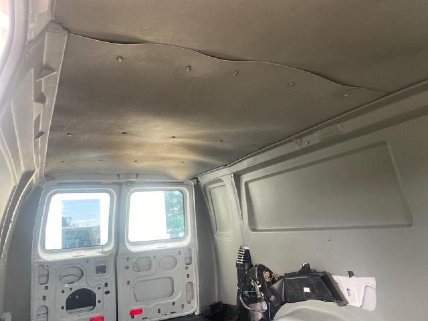 2010 Oxford White /Medium Flint Ford Econoline Cargo Van ext. low miles 54,224 (1FTSS3EL1AD) with an 5.4L SOHC EFI Flex-Fuel V8 Engine engine, Automatic transmission, located at 4701 North Dixie Hwy, Pompano Beach, FL, 33064, (954) 422-2889, 26.240938, -80.123474 - OUR WEBPAGE FLORIDACARS1.COM HAS OVER 100 PHOTOS AND FREE CARFAX LINK 2010 FORD E-SERIES E-350 SD EXT HARD TO FIND! VIN: 1FTSS3EL1ADA67398 1 F T S S 3 E L 1 A D A 6 7 3 9 8 VAN 5.4L V8 F SOHC 16V GASOLINE DUAL AC RARE OPTION. REAR WHEEL DRIVE Top Features Cloth Seats Basic Features ABS Brakes Air Co - Photo#96