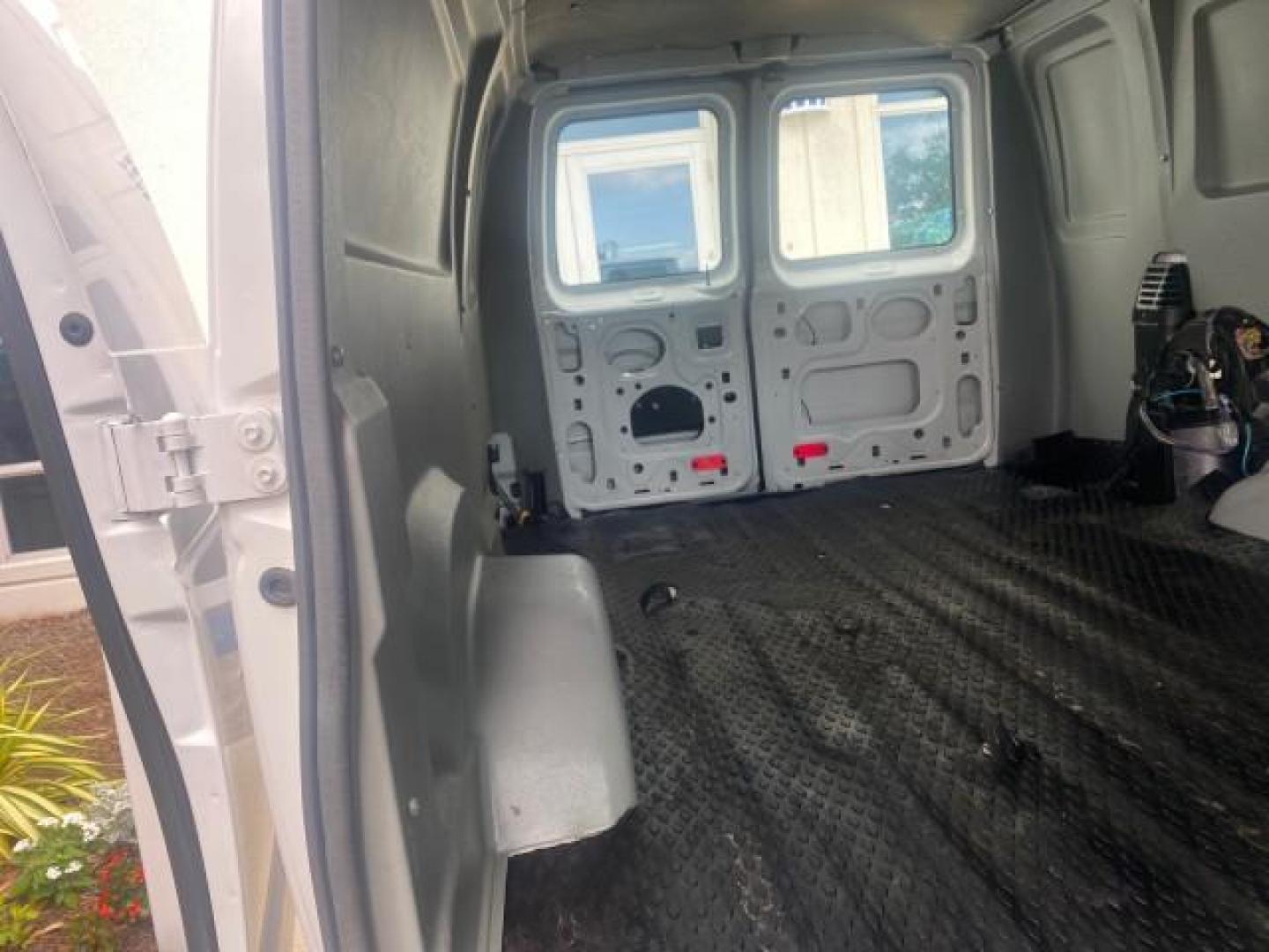 2010 Oxford White /Medium Flint Ford Econoline Cargo Van ext. low miles 54,224 (1FTSS3EL1AD) with an 5.4L SOHC EFI Flex-Fuel V8 Engine engine, Automatic transmission, located at 4701 North Dixie Hwy, Pompano Beach, FL, 33064, (954) 422-2889, 26.240938, -80.123474 - OUR WEBPAGE FLORIDACARS1.COM HAS OVER 100 PHOTOS AND FREE CARFAX LINK 2010 FORD E-SERIES E-350 SD EXT HARD TO FIND! VIN: 1FTSS3EL1ADA67398 1 F T S S 3 E L 1 A D A 6 7 3 9 8 VAN 5.4L V8 F SOHC 16V GASOLINE DUAL AC RARE OPTION. REAR WHEEL DRIVE Top Features Cloth Seats Basic Features ABS Brakes Air Co - Photo#98